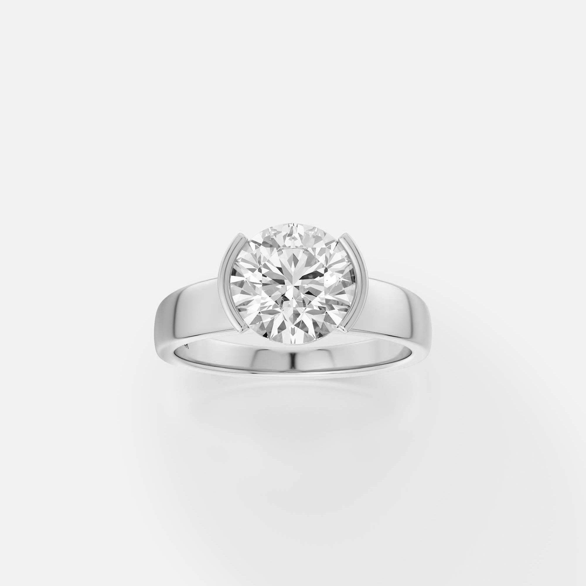 Miri round diamond tapering partial bezel engagement ring front view in platinum