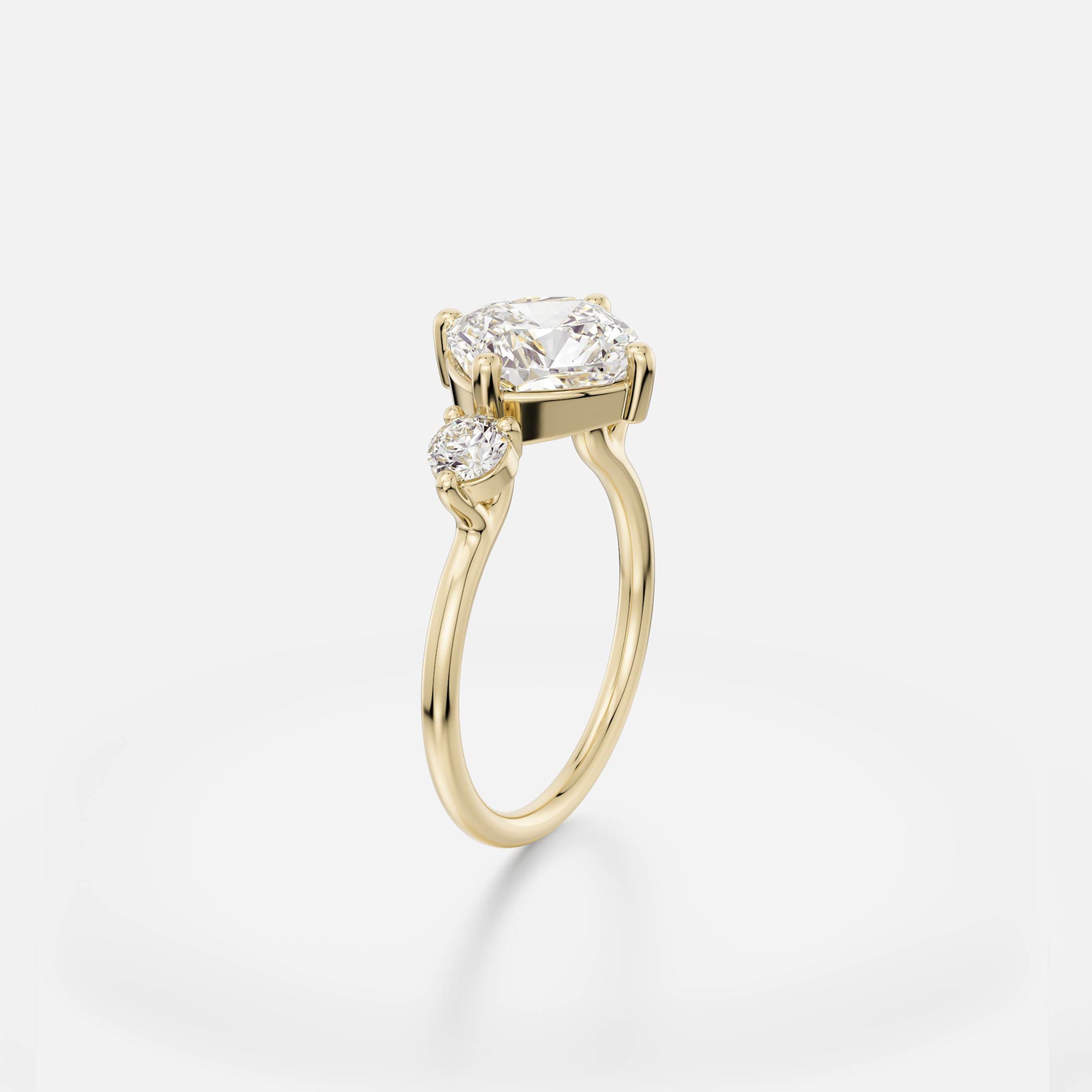 Kele cushion diamond compass prong engagement ring angled side view