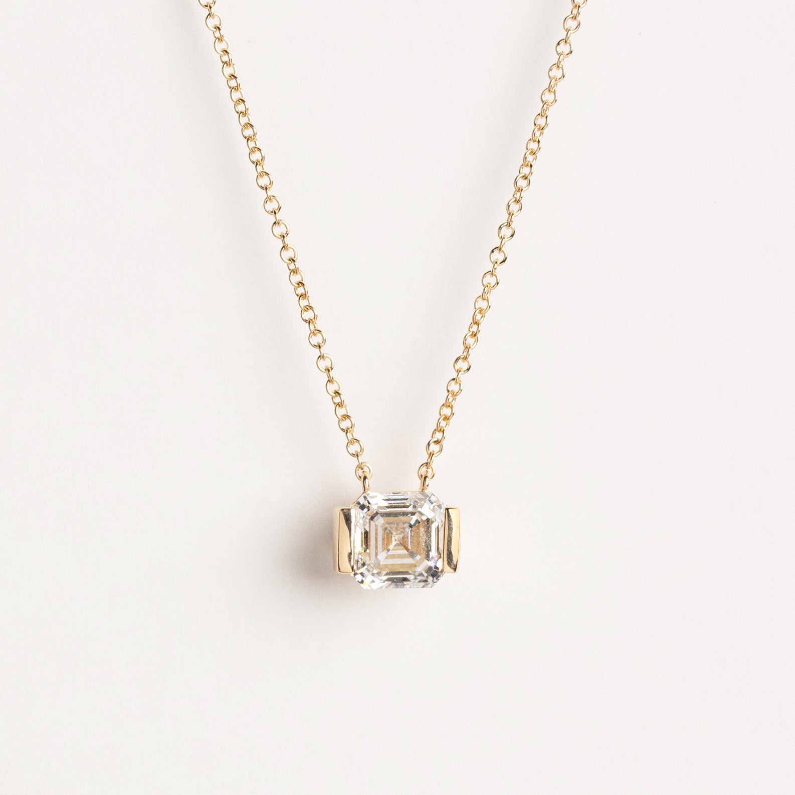 Asscher-cut lab-grown diamond half-bezel necklace in 14k yellow gold
