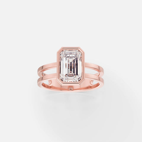 14k rose gold double band engagement ring with 2 carat emerald-cut diamond in thin bezel setting