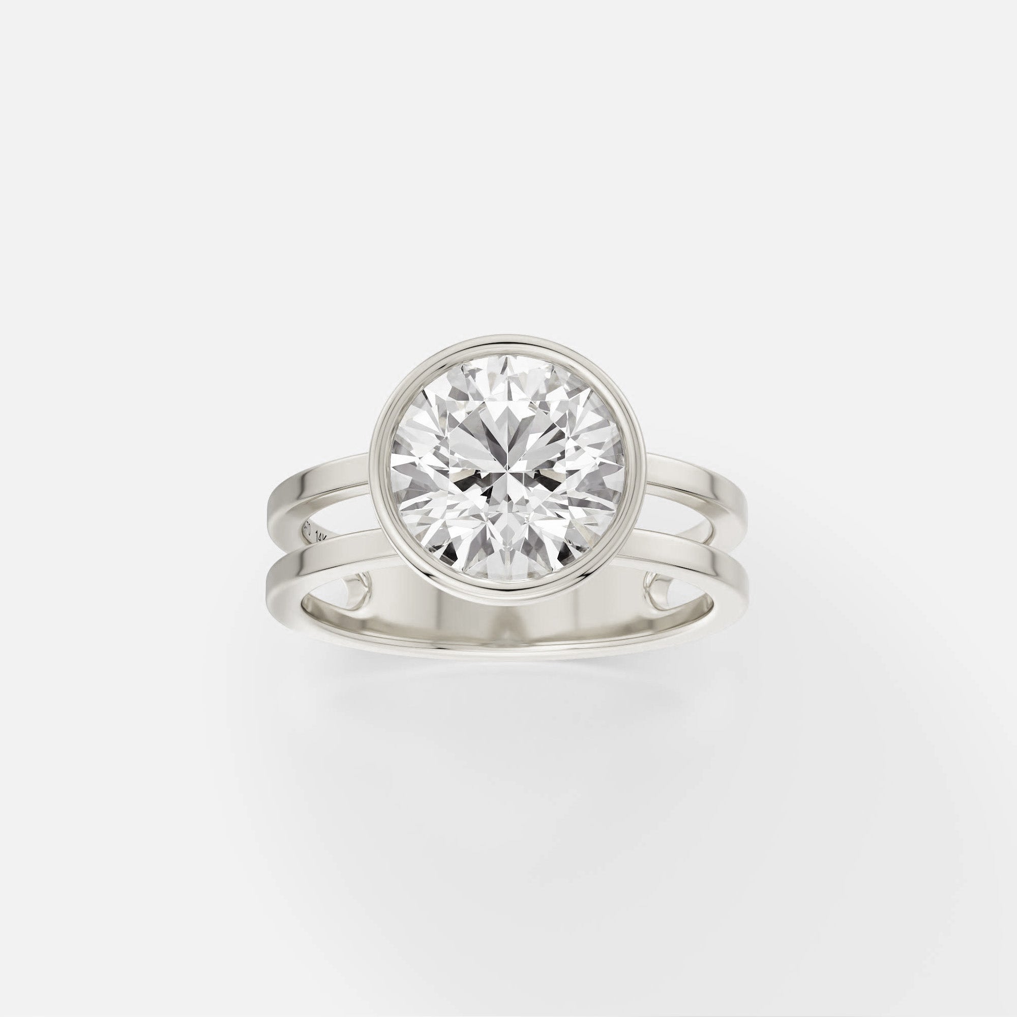 14k white gold double band engagement ring with 2 carat round brilliant-cut diamond in thin bezel setting