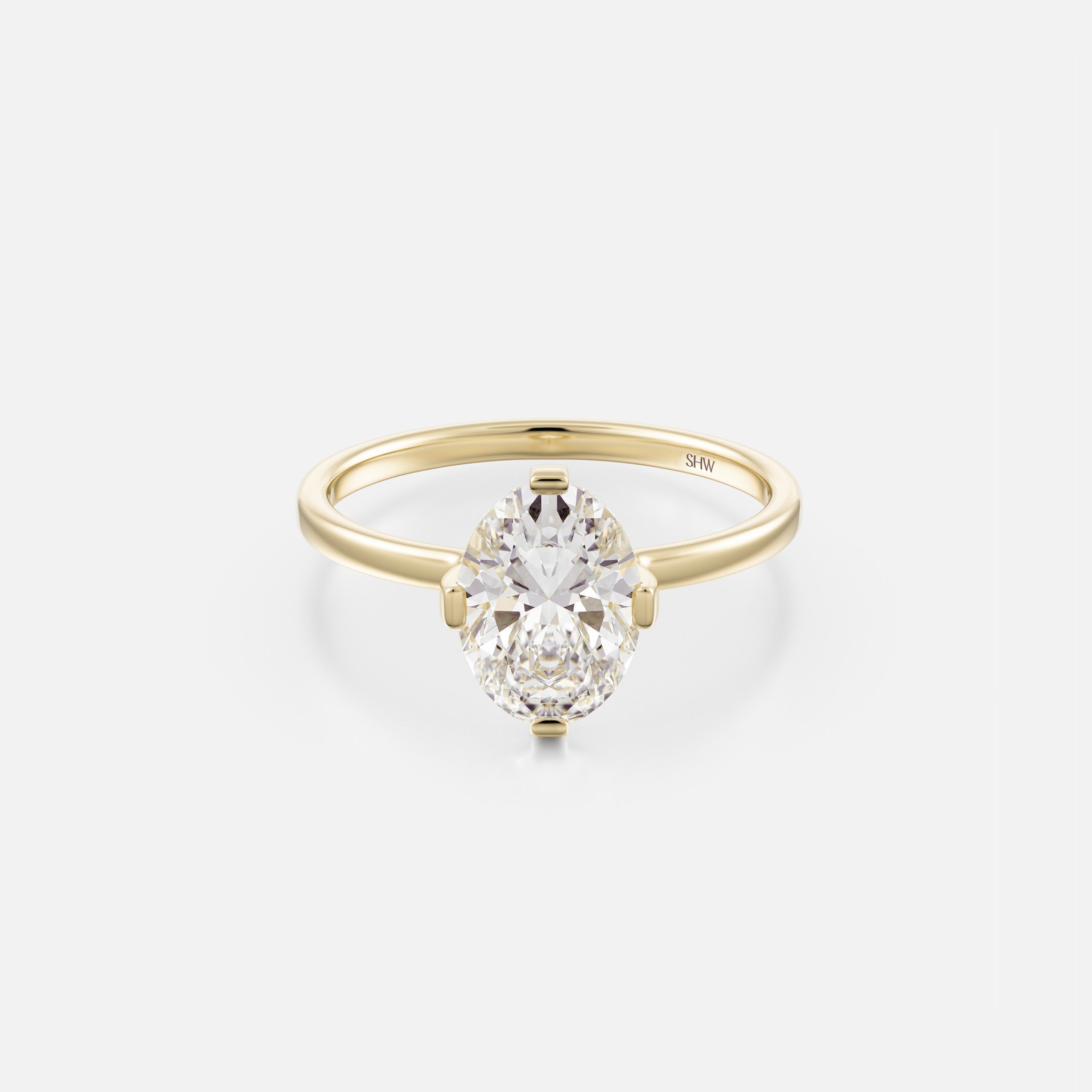 14k yellow gold thin flat band engagement ring with 1.75 carat oval diamond set north south