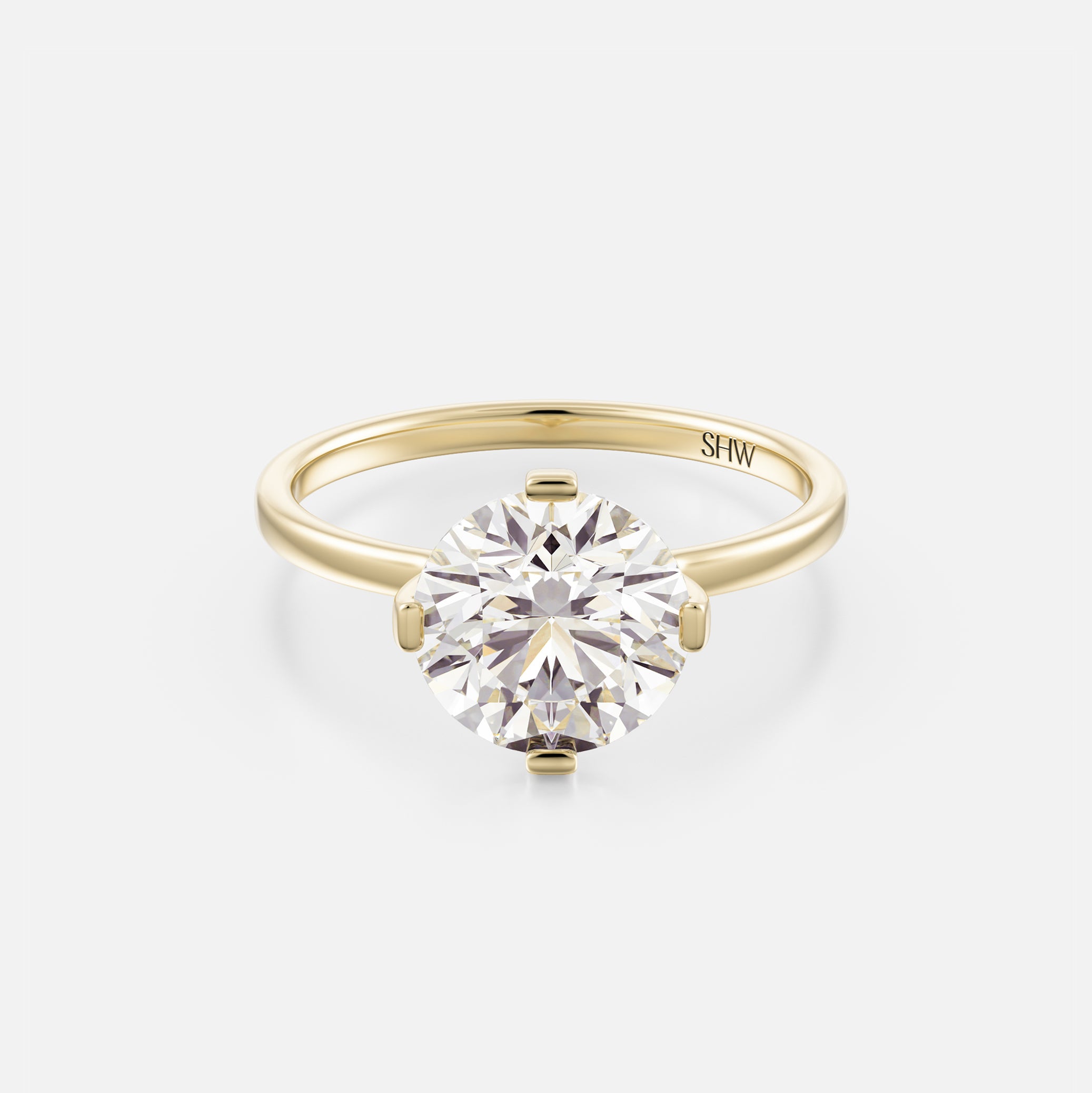 14k yellow gold thin flat band engagement ring with 2.50 carat round brilliant diamond