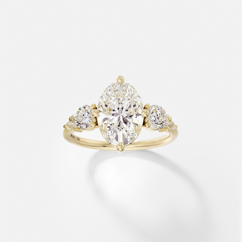 Gija oval five stone diamond cluster engagement ring front view in 14k yellow gold