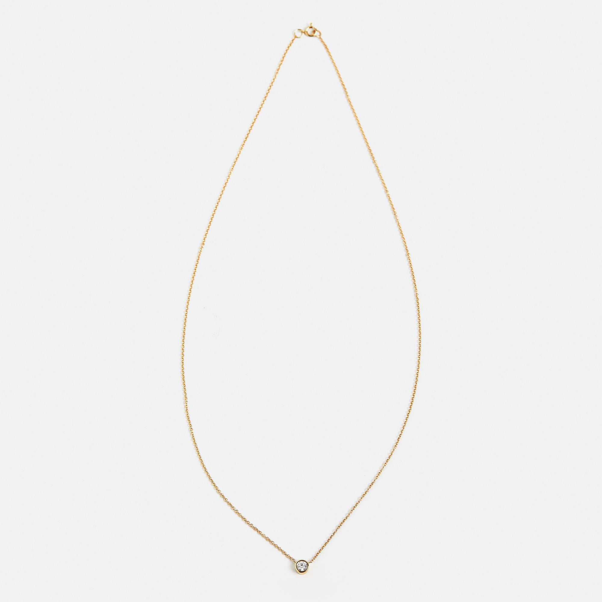 Minimalist dainty chain necklace with simple round white diamond pendant in 14k 18k yellow white rose gold by SHW fine jewelry store in NYC