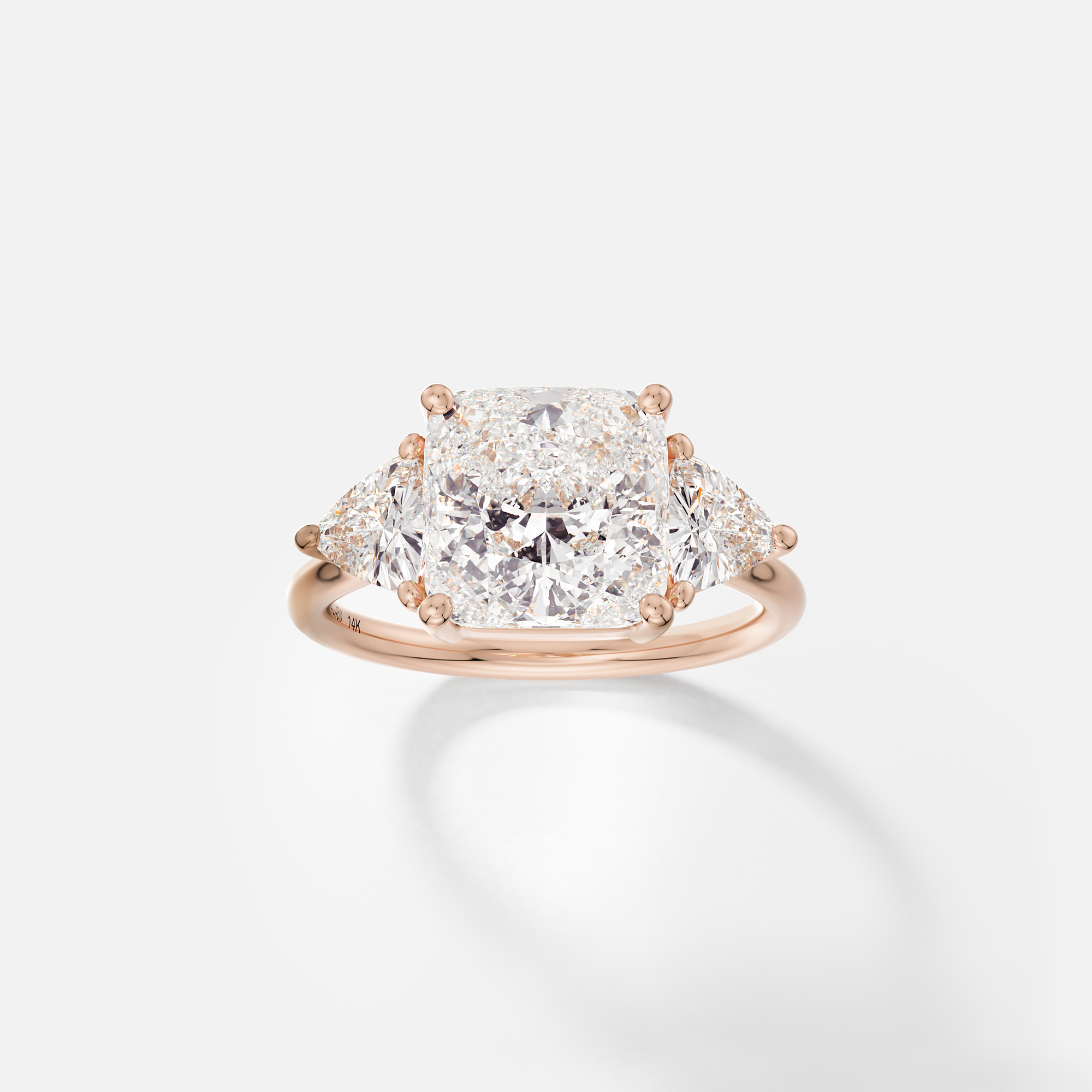 Kala cushion diamond three stone trillion engagement ring front view in 14k rose gold