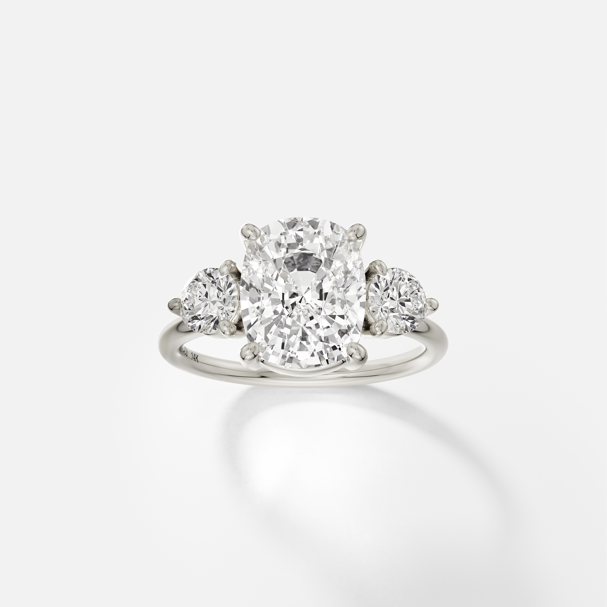 Kala elongated cushion diamond three stone engagement ring front view in 14k white gold