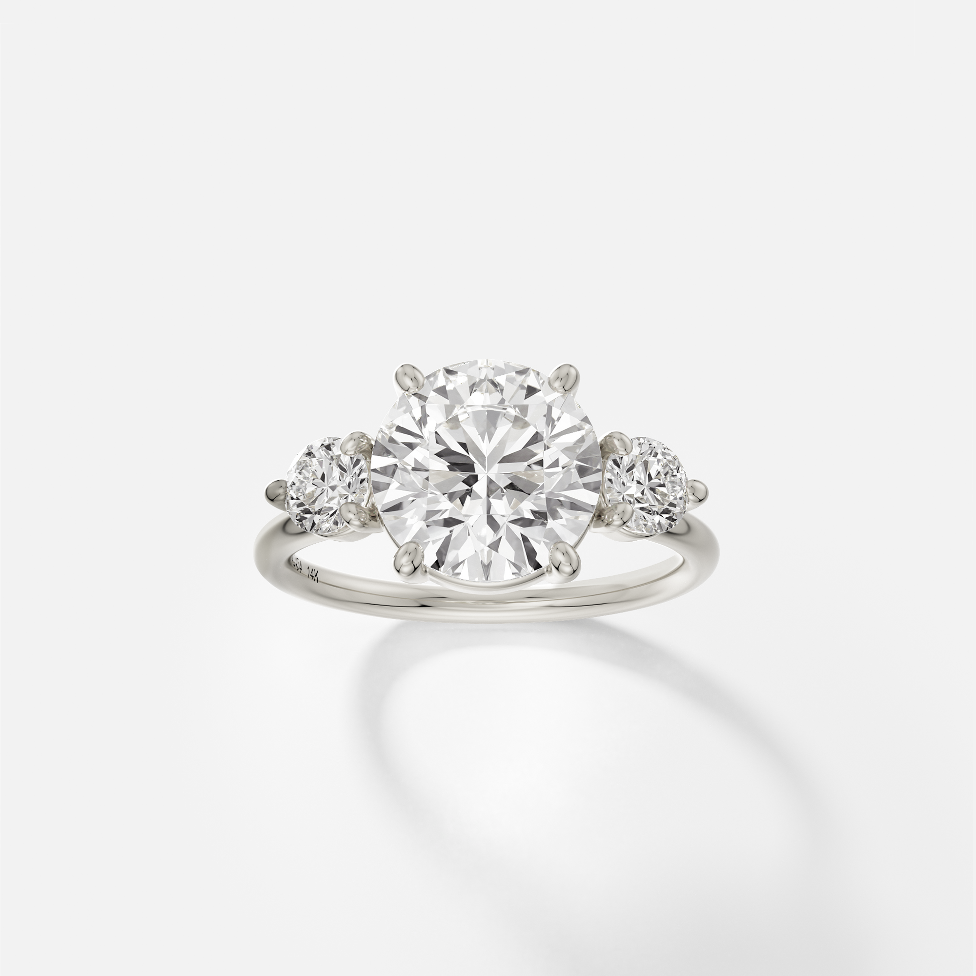 Kala round diamond three stone engagement ring front view in 14k white gold