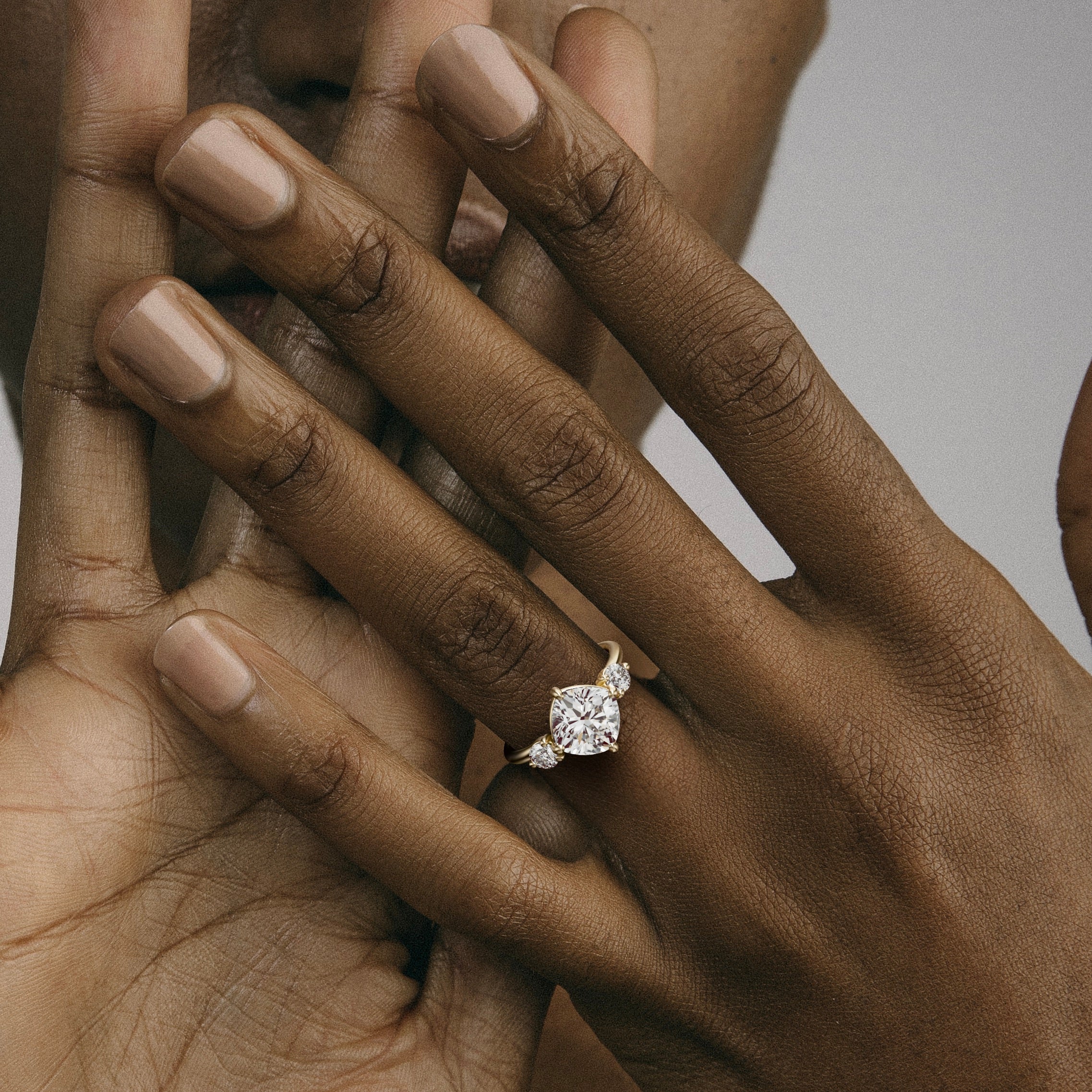 Kele 3.25 carat tilted cushion diamond ring close hand detail