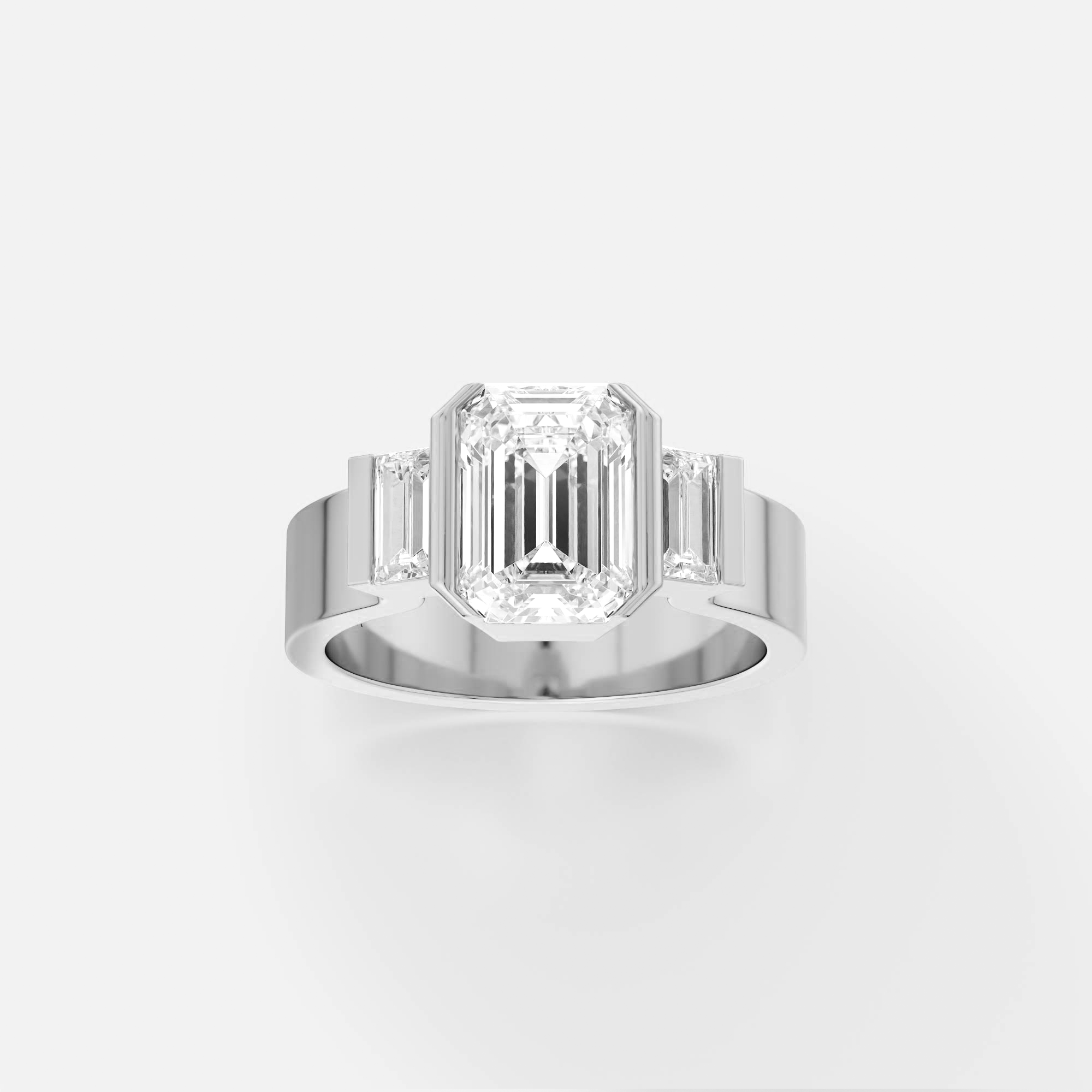 platinum engagement ring with emerald-cut diamond and baguette side stones in minimal partial bezel design