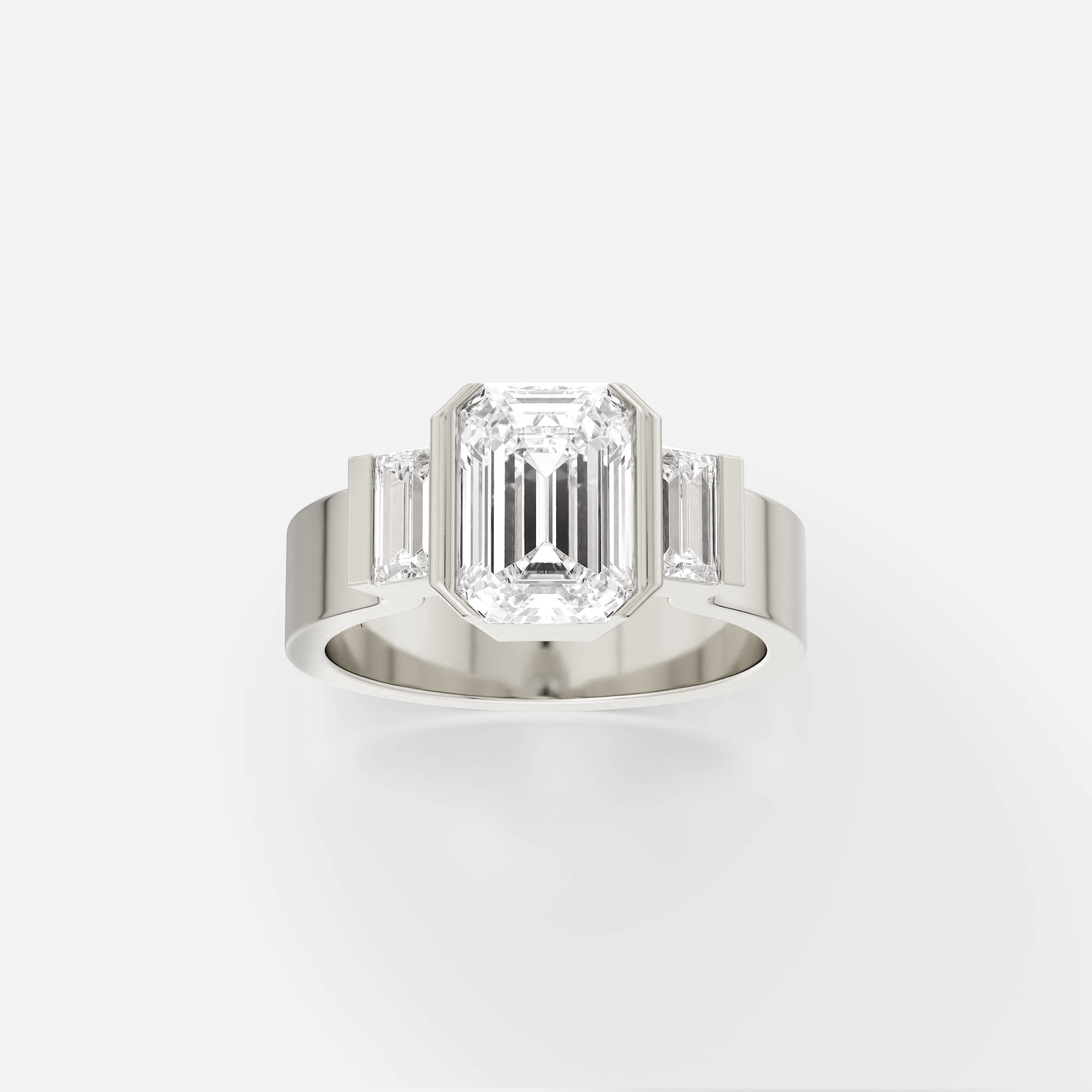 14k white gold engagement ring with emerald-cut diamond and baguette side stones in modern partial bezel setting