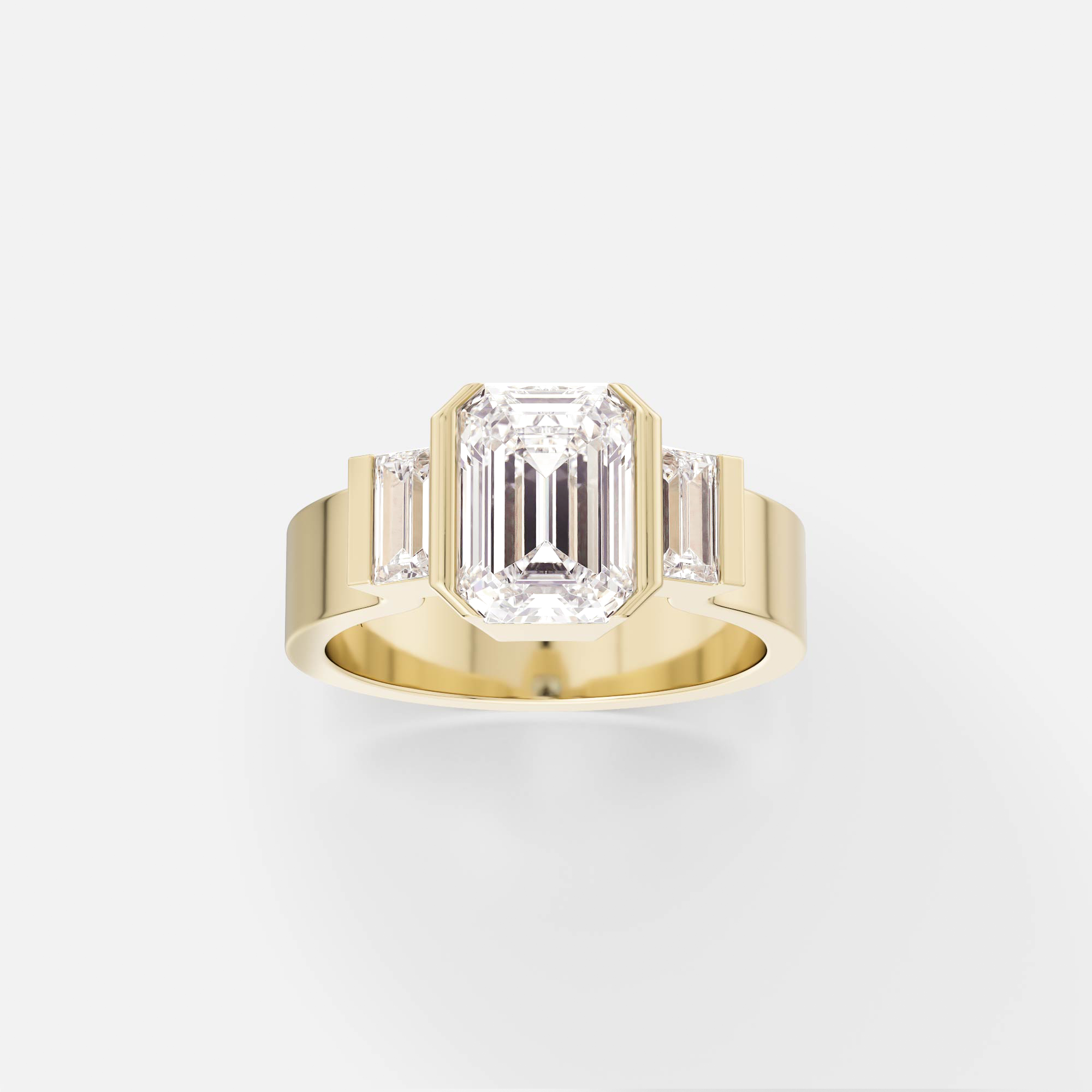14k yellow gold engagement ring with north-south emerald-cut diamond and baguette side stones in partial bezel setting on flat profile band