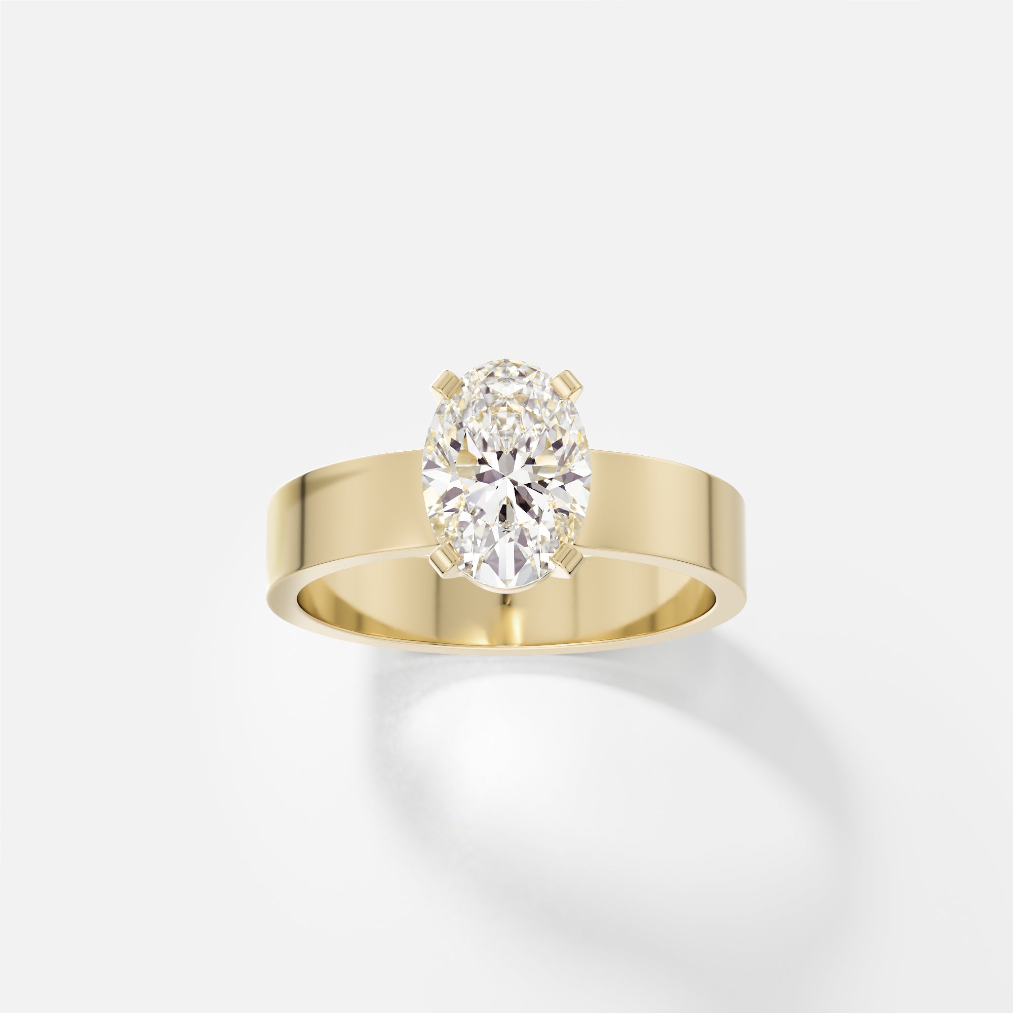 14k yellow gold engagement ring with 1.50 carat oval diamond set north south in corner prongs on flat profile band
