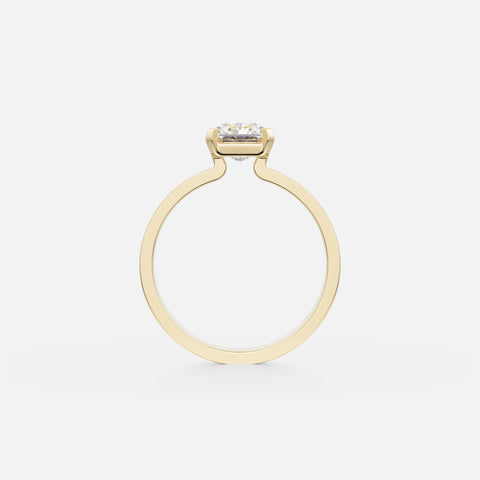 14 karat yellow gold engagement ring with radiant-cut diamond in corner prong setting on wide back flat profile band