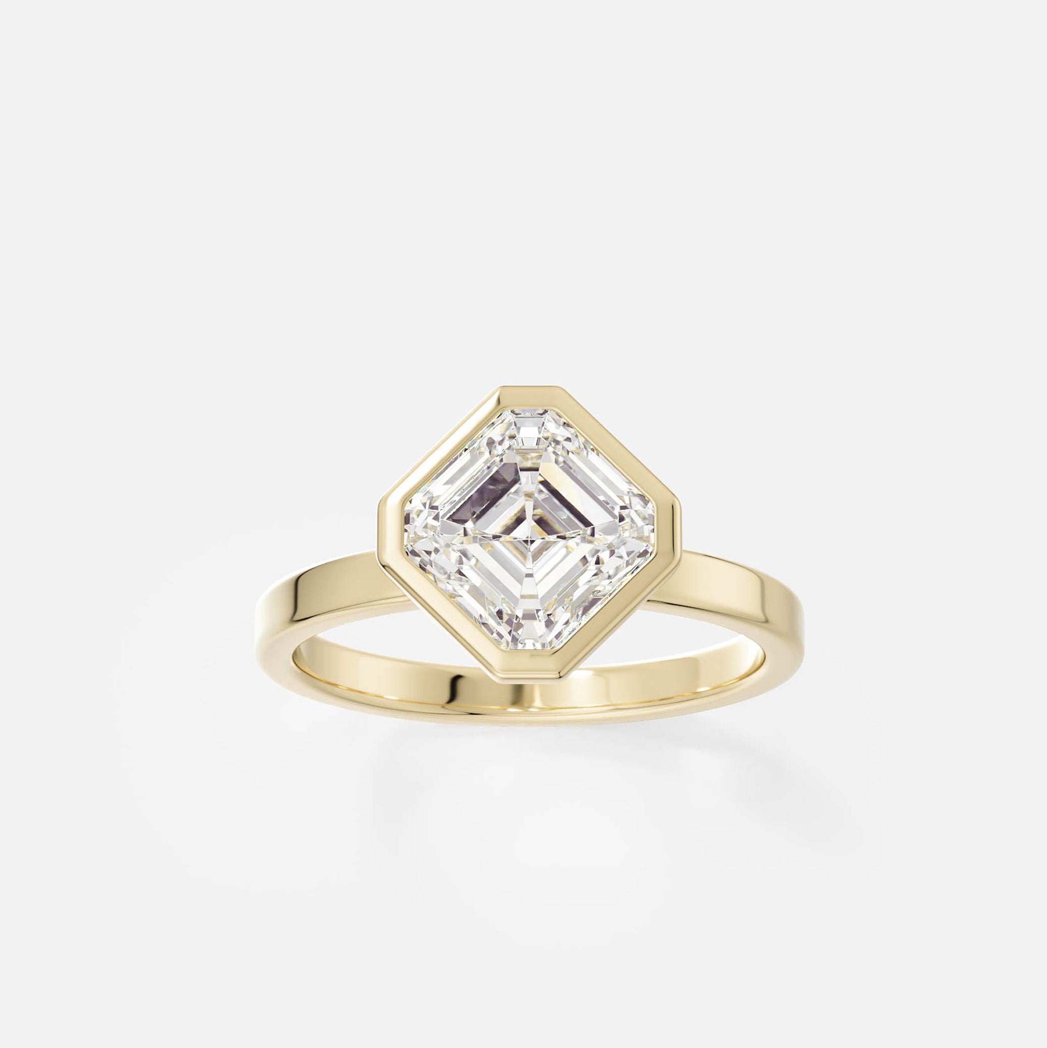 14k yellow gold engagement ring with tilted asscher-cut diamond in thin bezel setting on flat profile band open setting