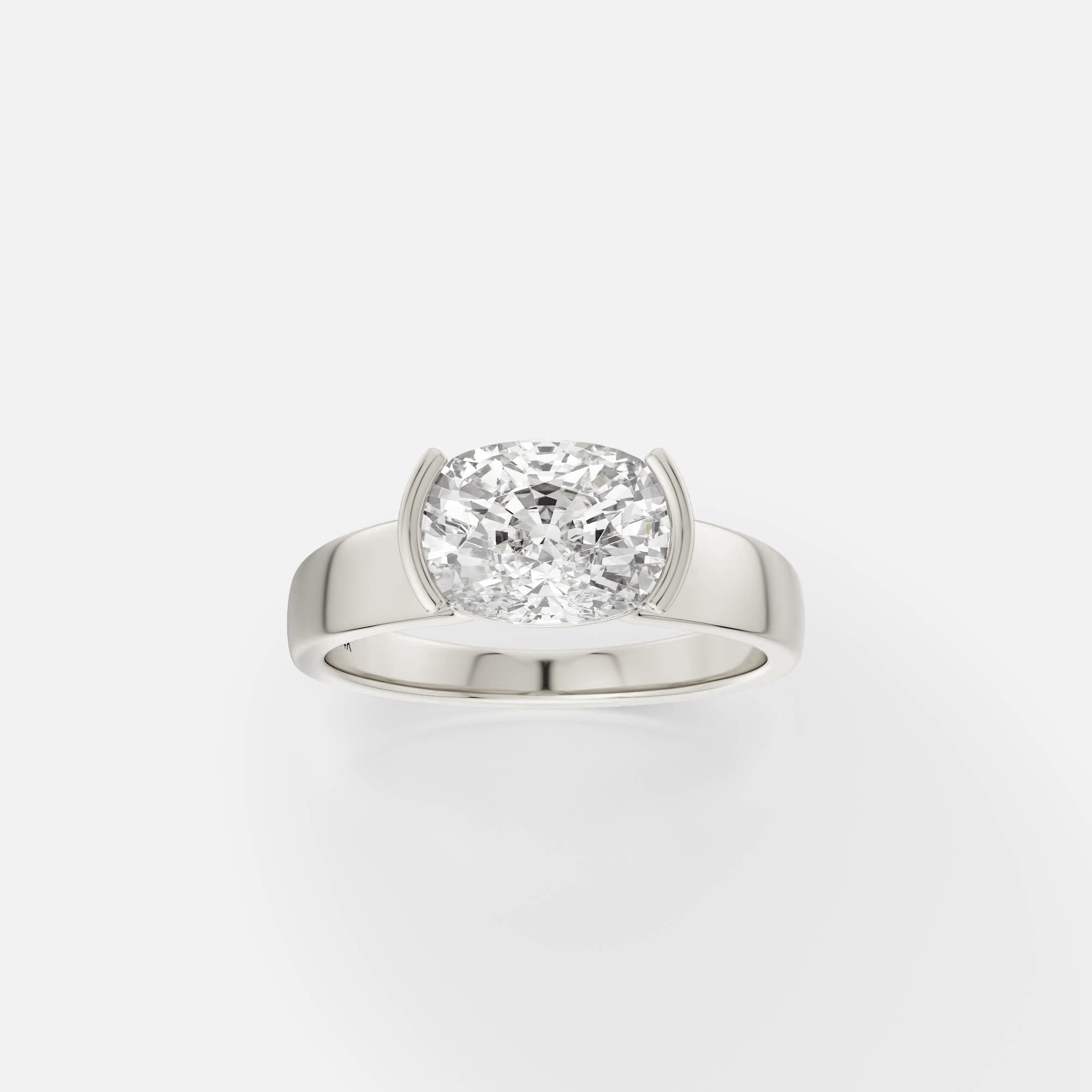 14k white gold engagement ring with 2.00 ct east-west cushion diamond in tapering partial bezel setting