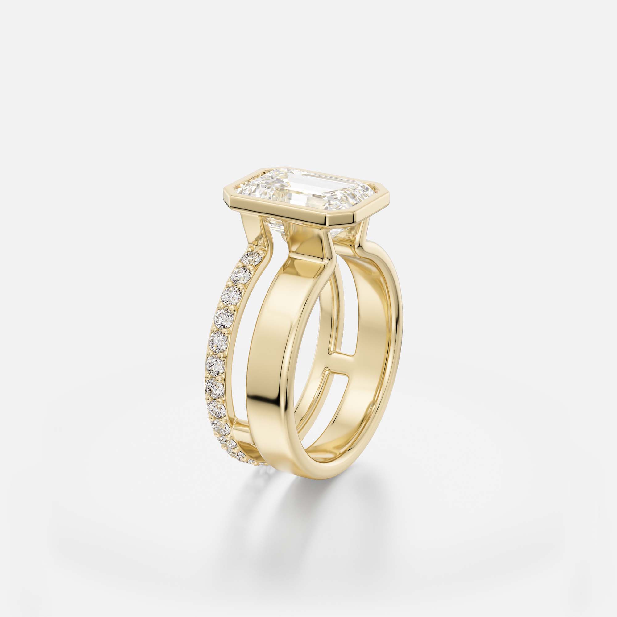 4 ct emerald-cut diamond engagement ring with bezel setting and pavé diamond eternity band on sculptural double band