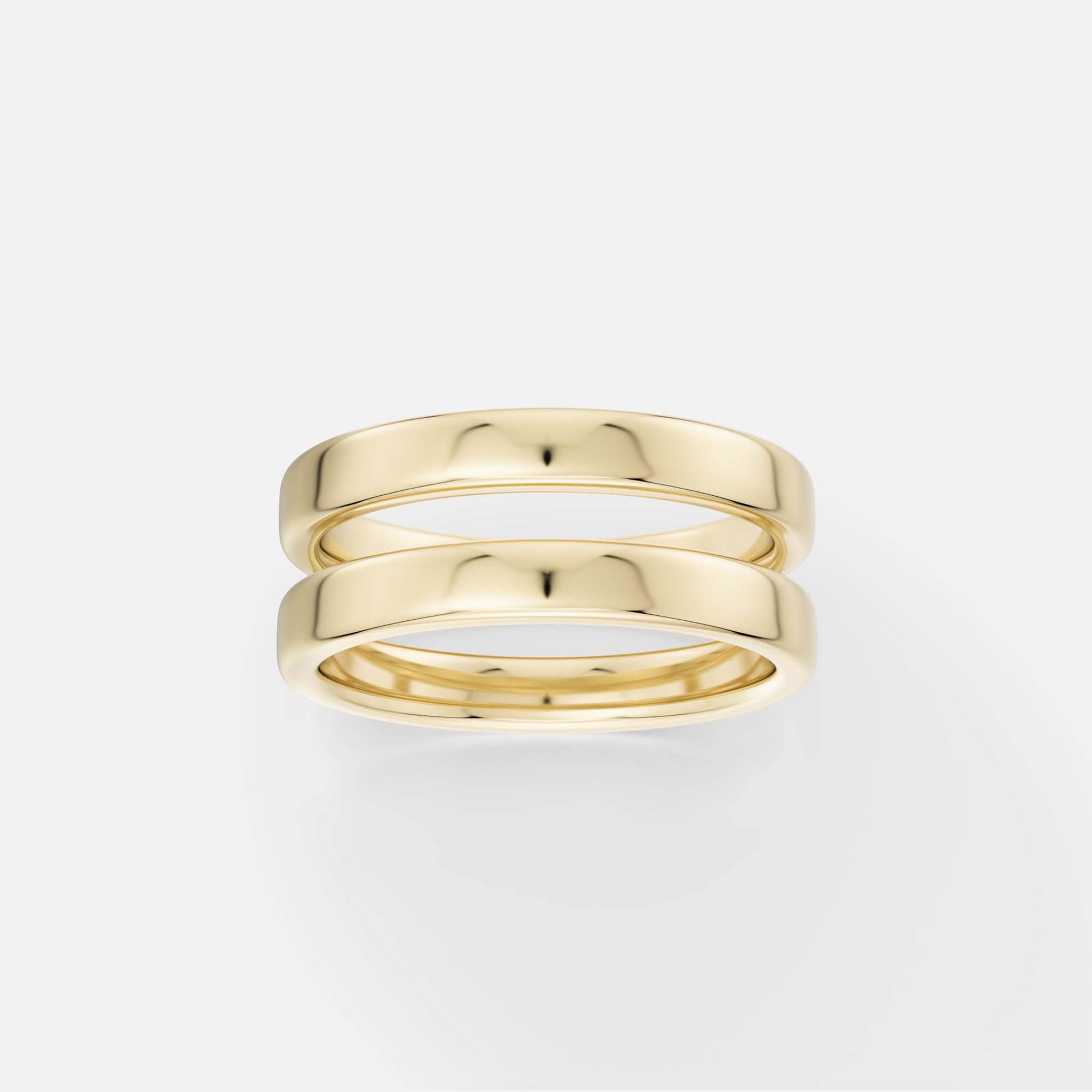 14k yellow gold double band wedding ring with a sculptural stacked design
