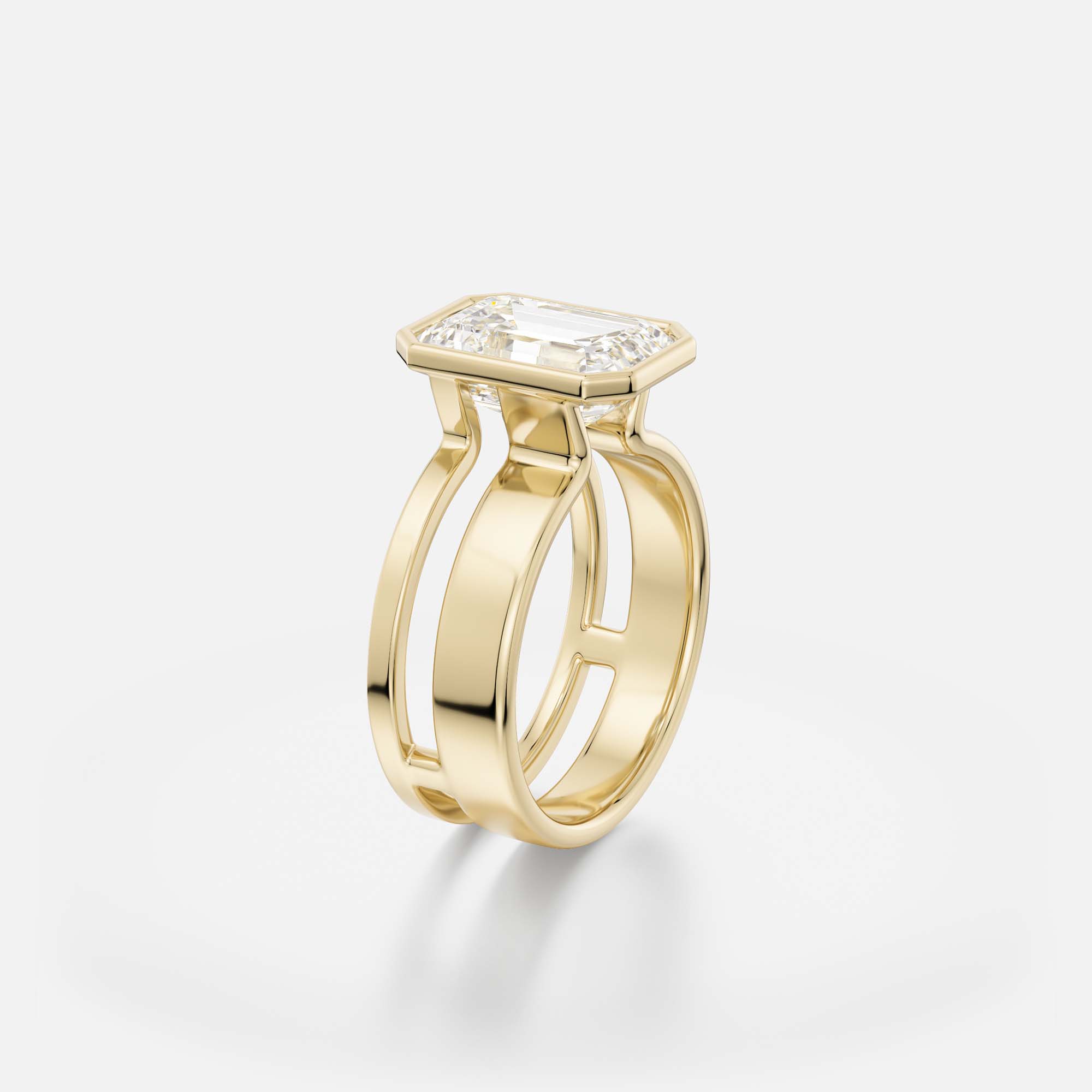 4 ct emerald cut step-cut diamond engagement ring with open bezel setting on asymmetrical double band