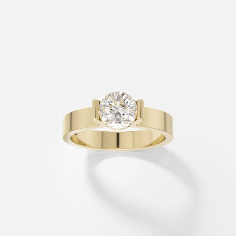 14k yellow gold wide flat band engagement ring with 1 carat round brilliant diamond in partial bezel setting