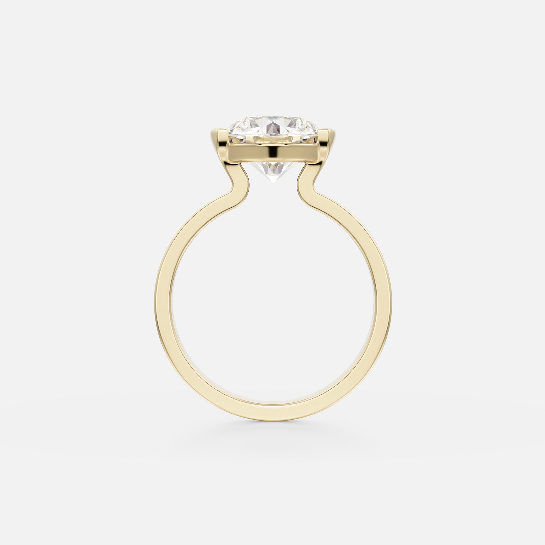 side view of 2.50 carat round brilliant diamond engagement ring with tapered partial bezel and wide flat band