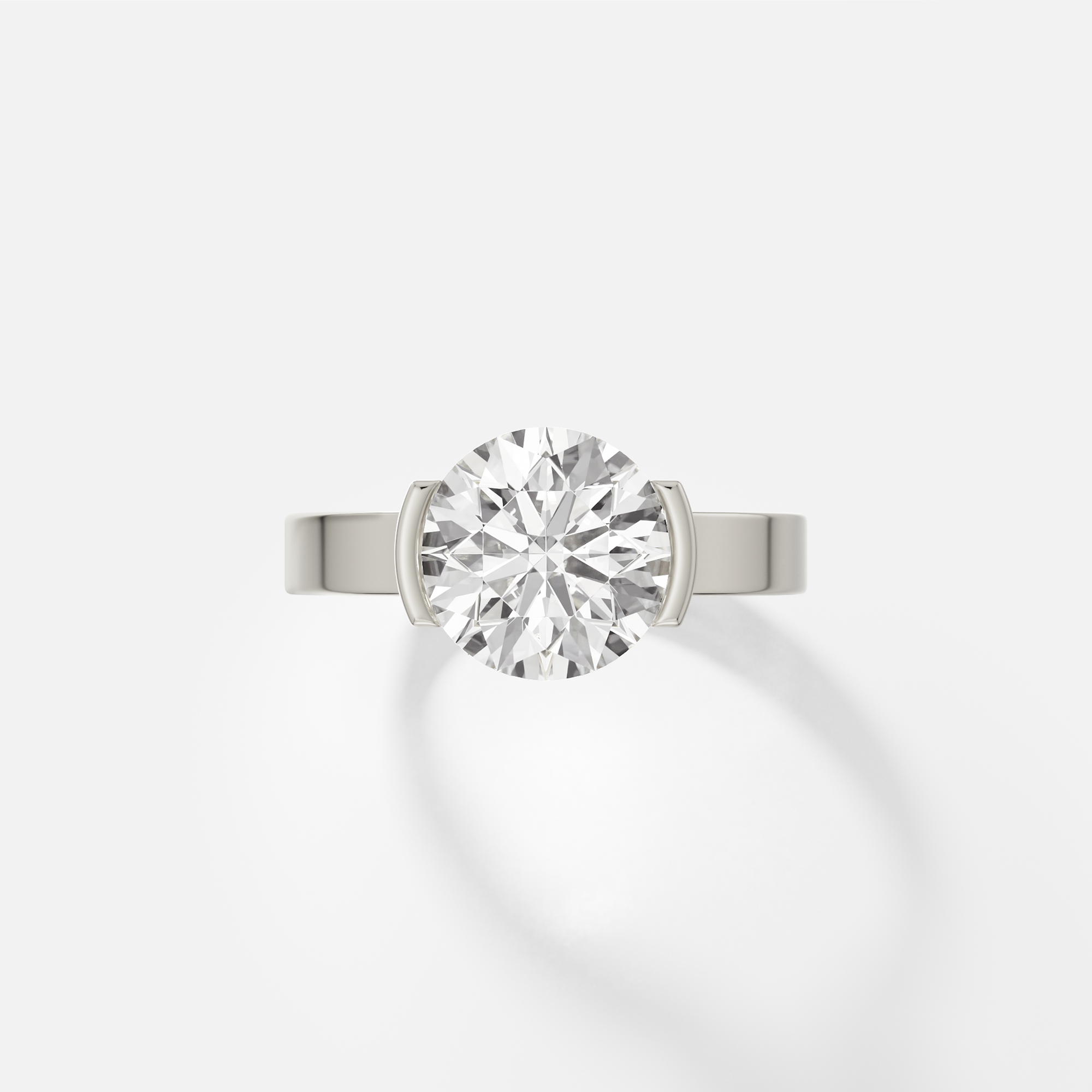 14k white gold engagement ring with 2.50 ct round brilliant diamond in tapered partial bezel setting