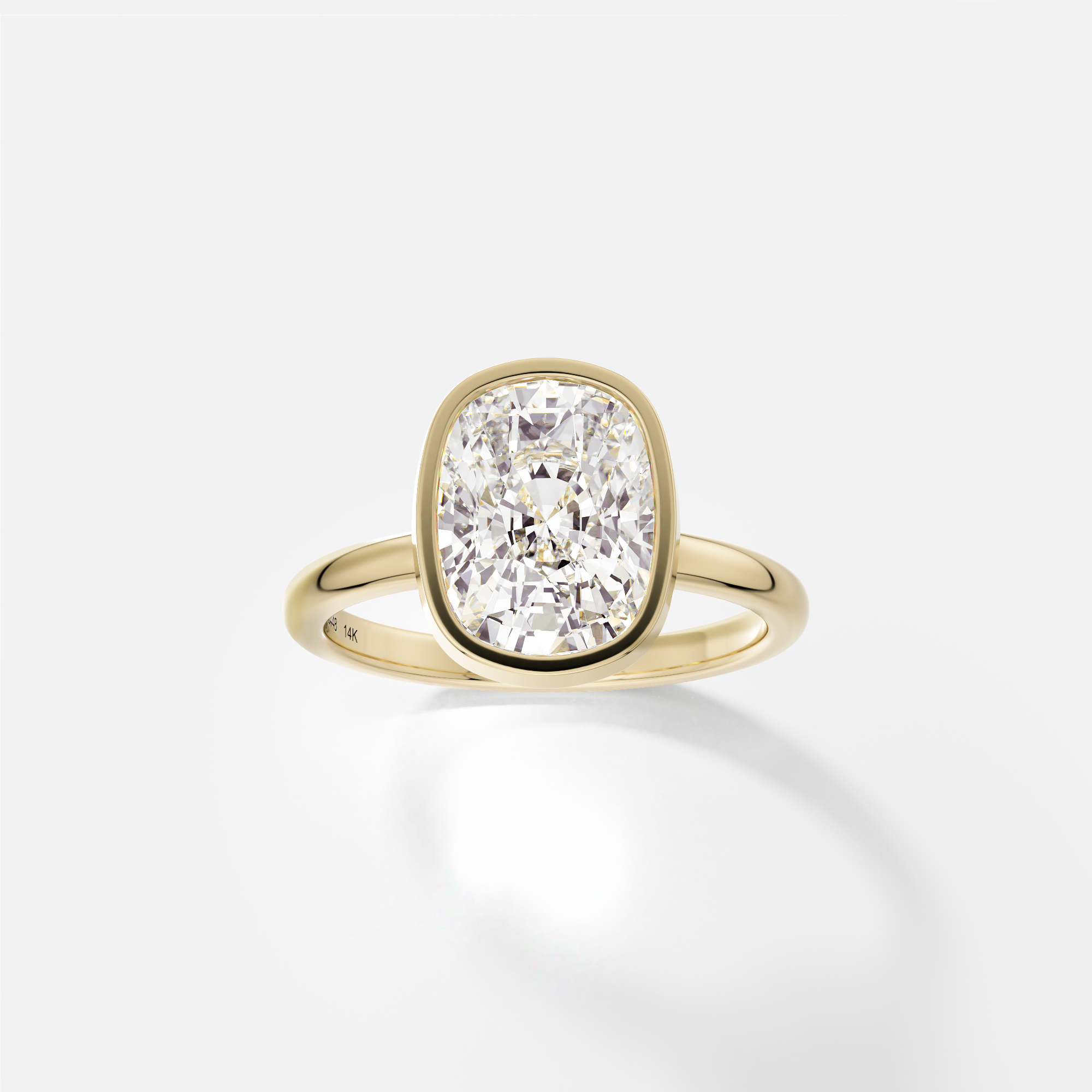 Syd elongated cushion diamond bezel engagement ring front view in 14k yellow gold
