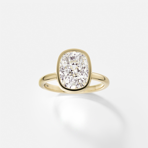 Syd elongated cushion diamond bezel engagement ring front view in 14k yellow gold