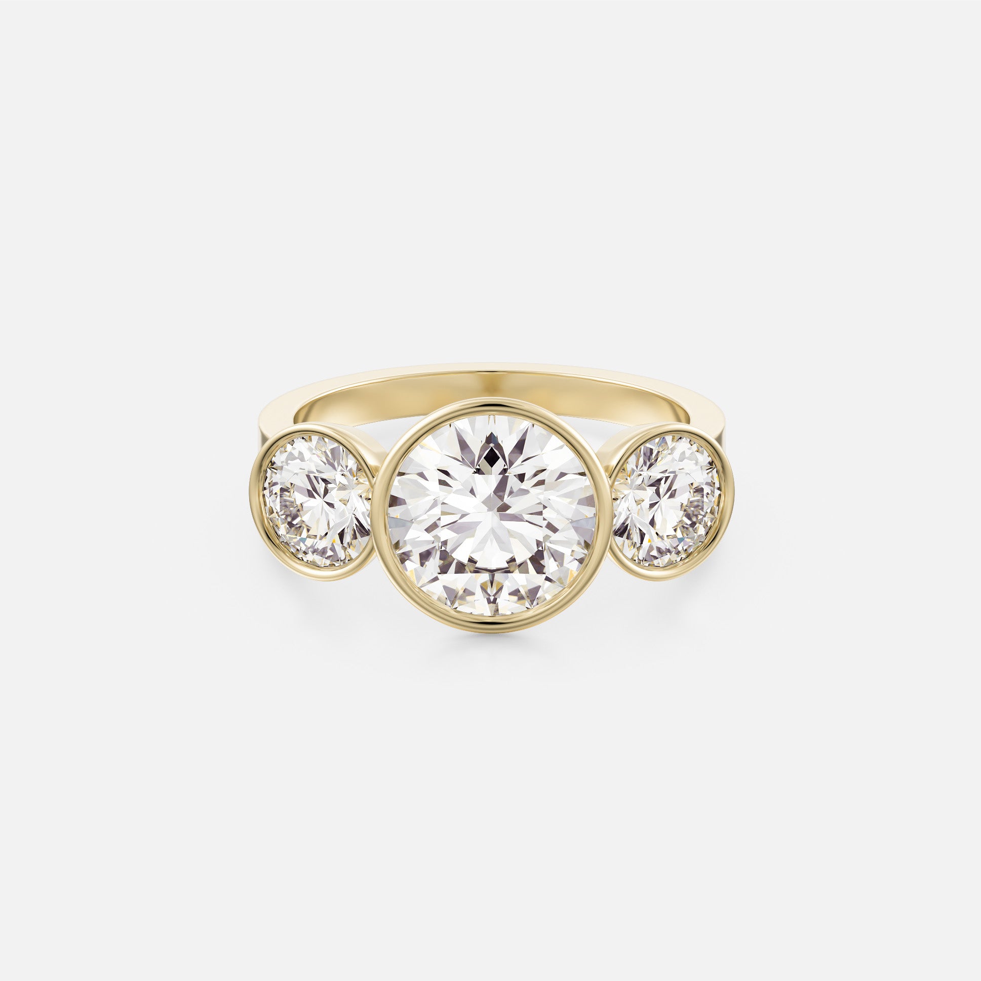 14k yellow gold three stone engagement ring with 2.5 carat center diamond and 0.75 carat side stones on flat profile band