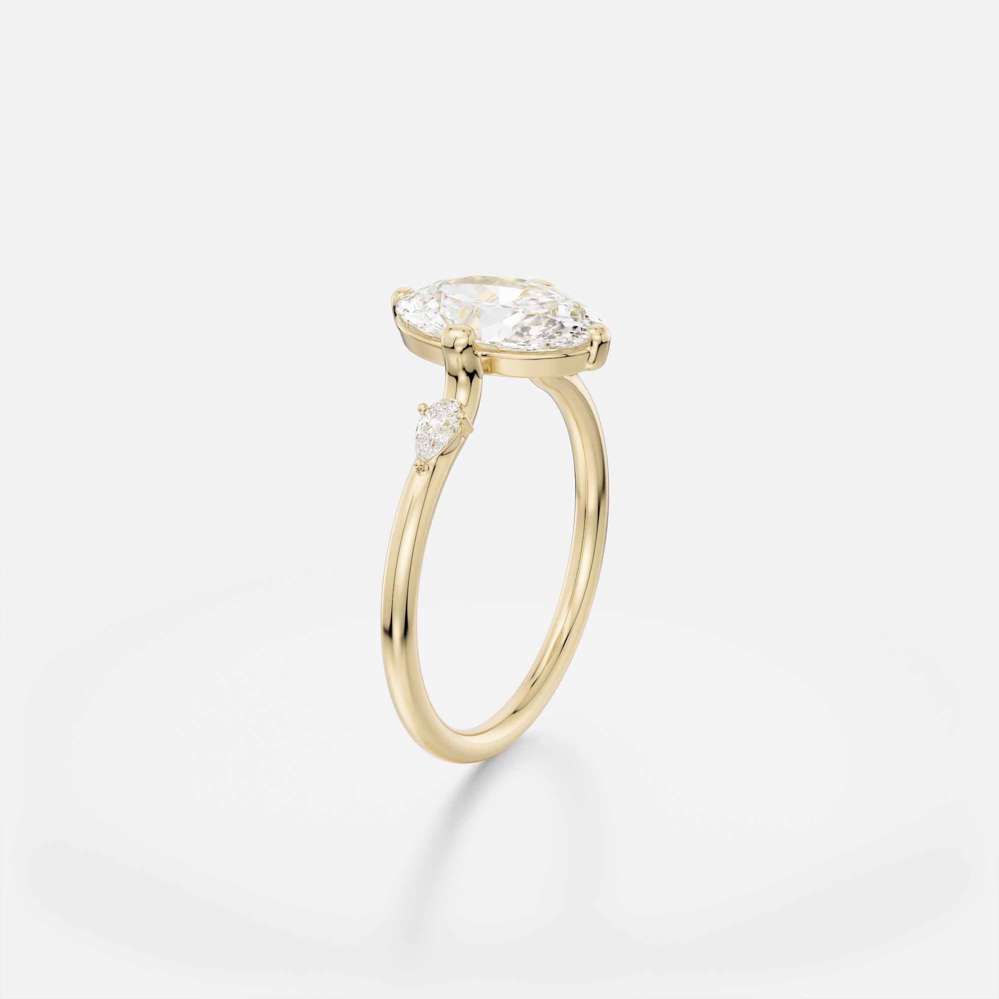 Minimalist Stone on Sides Engagement Ring Pears with Oval lab grown natural diamond 14k 18k gold platinum SHW fine jewelry NYC near me