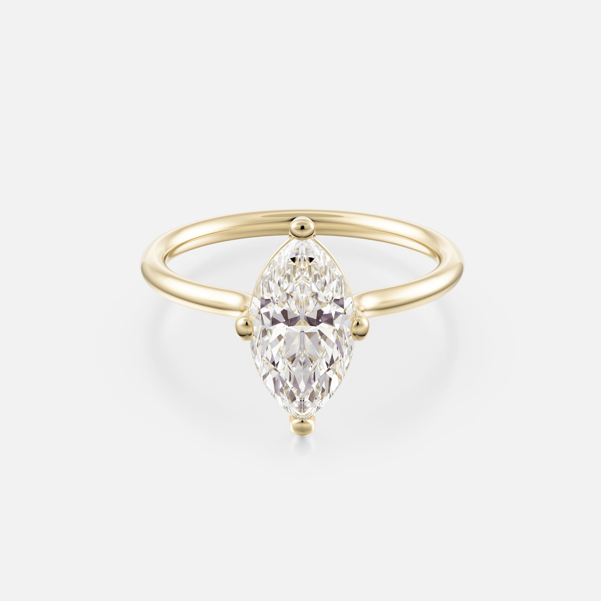 14k yellow gold engagement ring with 2 carat north-south marquise diamond on thin round profile band with compass prongs