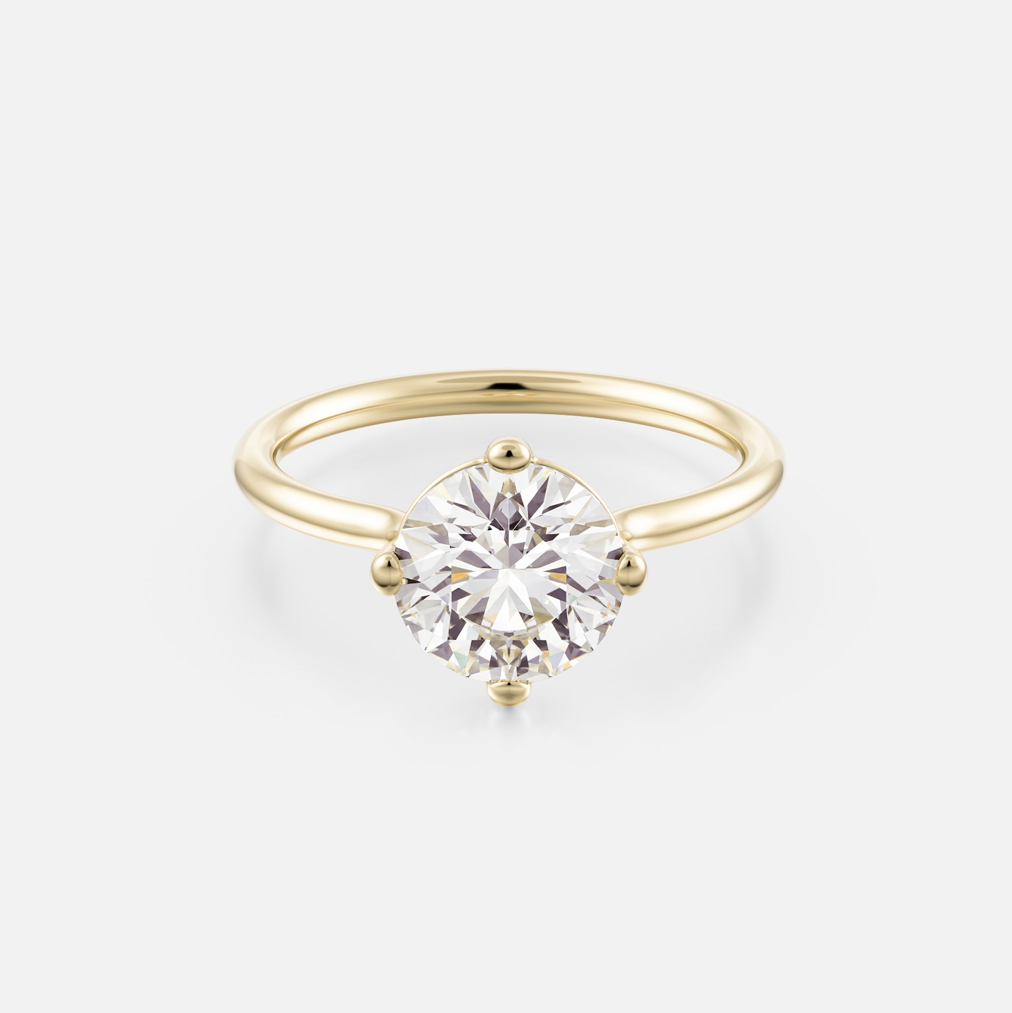 14k yellow gold engagement ring with 2.00 carat round brilliant diamond set in compass prongs on delicate round band