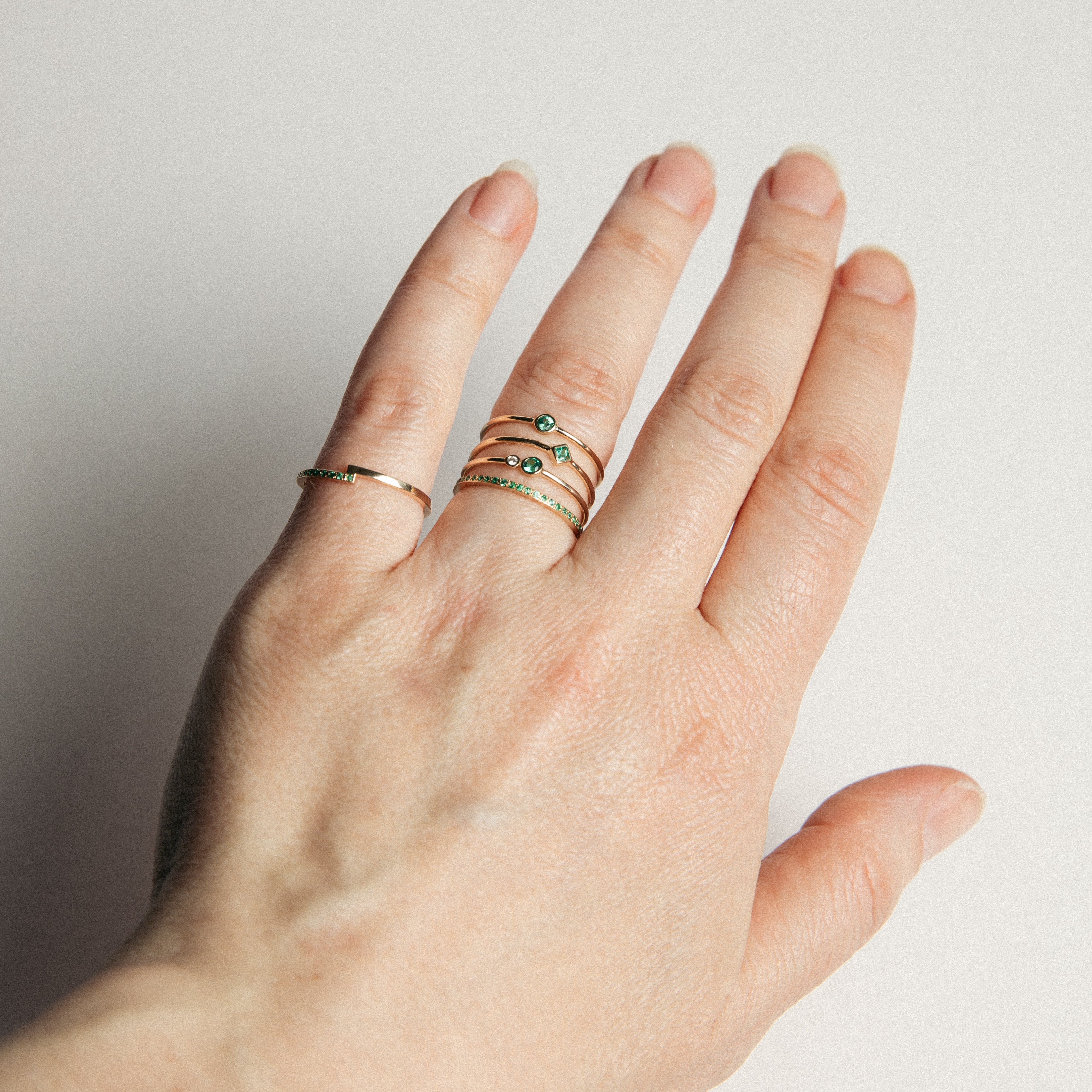 Eile Stackable Ring in 14k Yellow Gold set with with Emeralds 