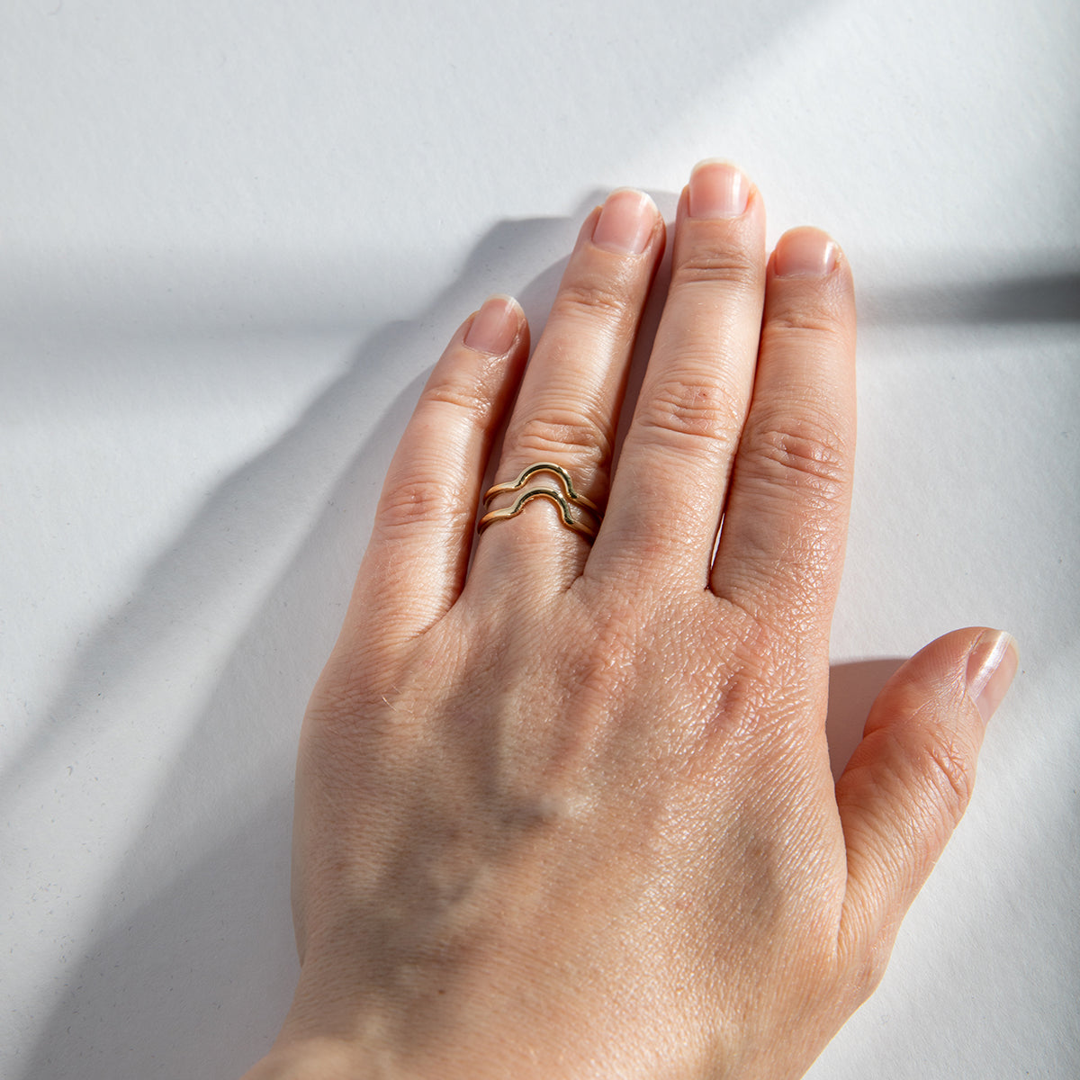 Simple Looking Round Curving Wedding Band stackable with low setting in Solid 14k gold by SHW best fine jewelry shop in New York City