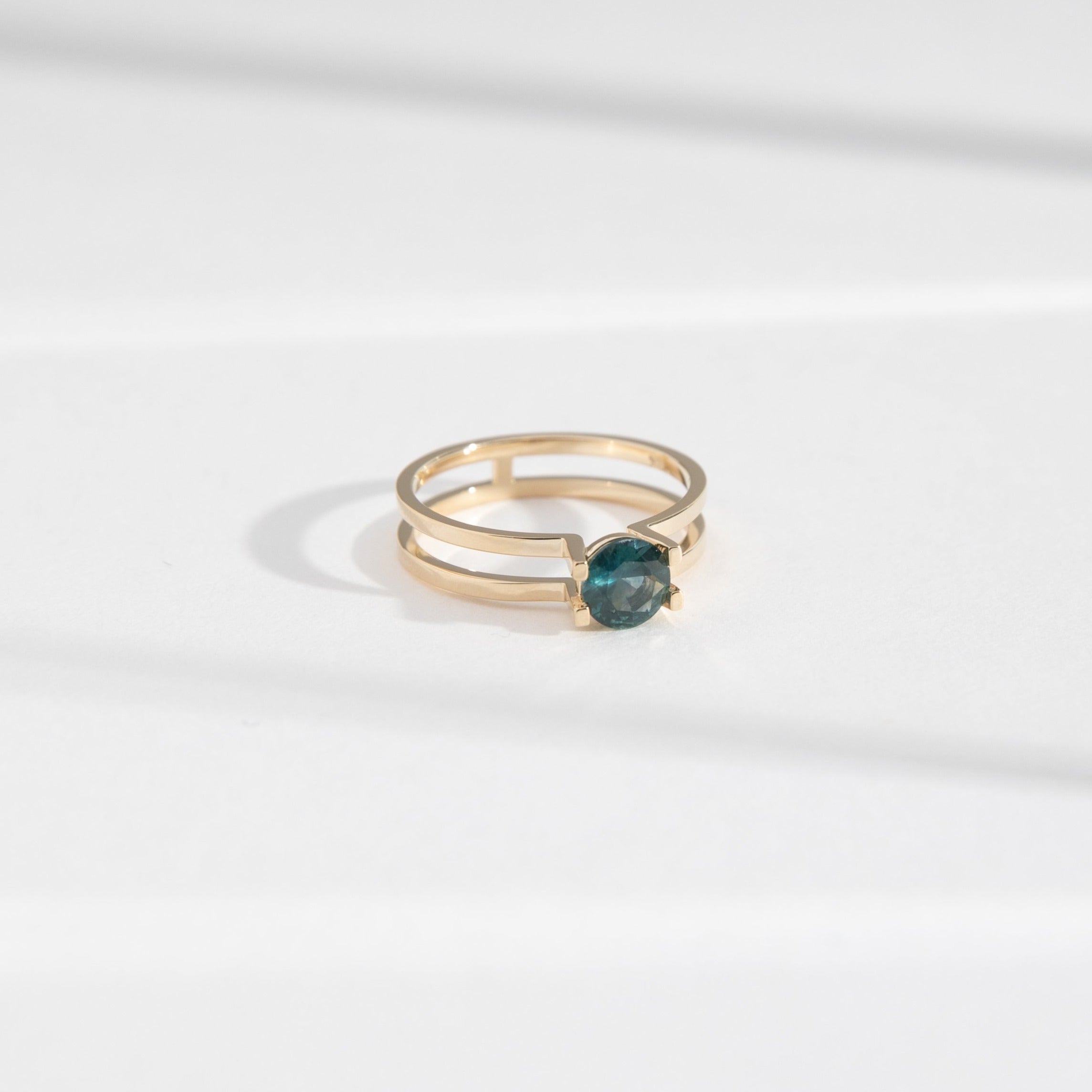Cara Handmade Ring in 14k Gold set with a 0.68ct dark teal round brilliant cut sapphire By SHW Fine Jewelry NYC