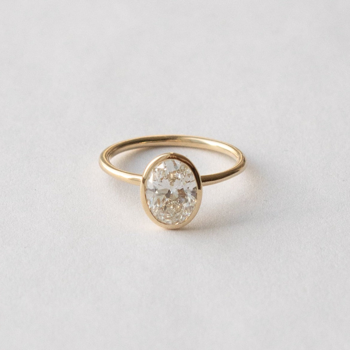 Artu Minimal Ring in 14k Gold set with 1.51ct oval cut lab-grown diamond By SHW Fine Jewelry NYC
