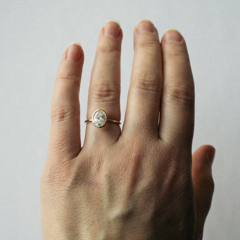 Artu Minimalistic Ring in 14k Gold set with sustainable 1.51ct oval cut lab-grown diamond By SHW Fine Jewelry NYC
