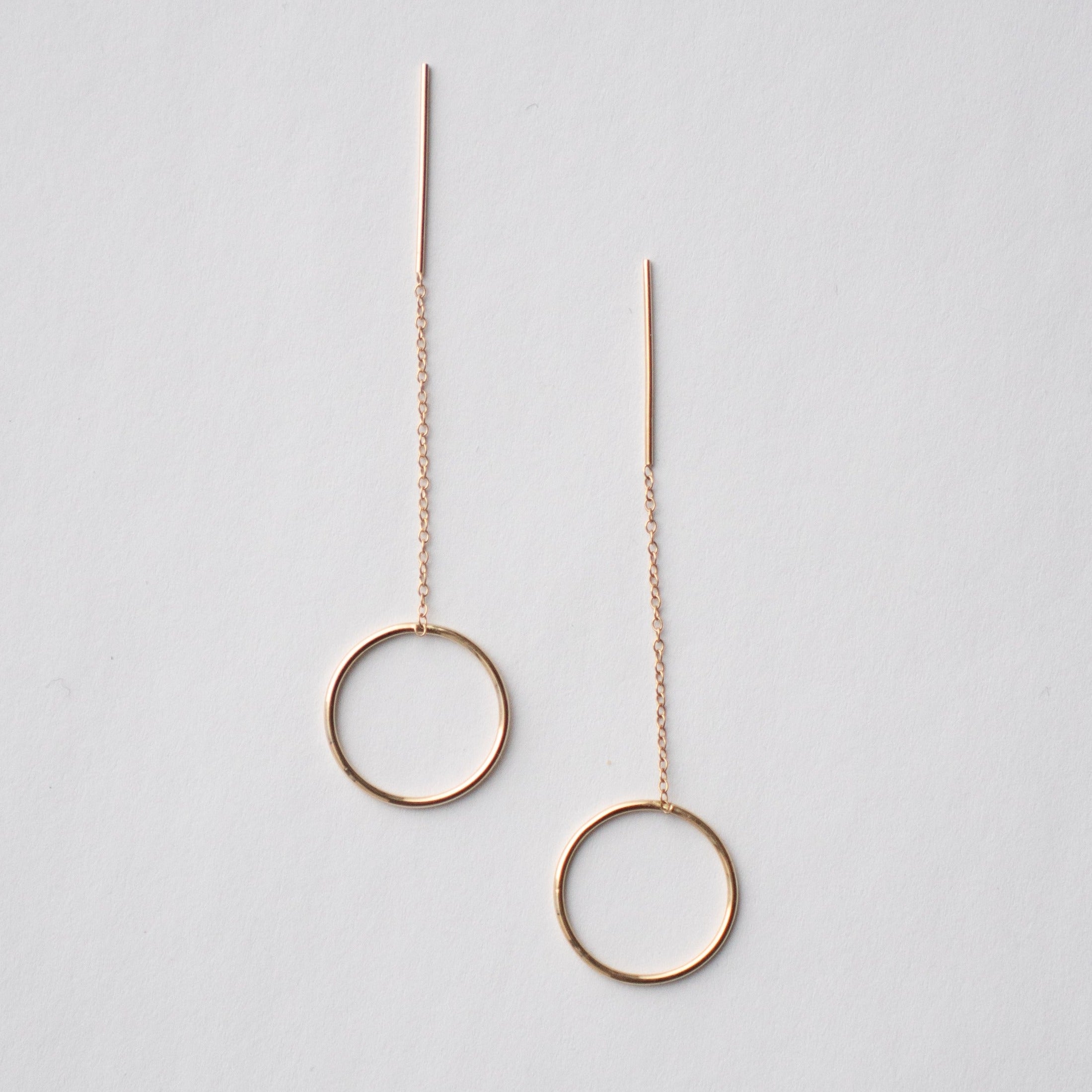 Minimalist Lili Pull-Through Circle earrings in 14 Karat yellow gold by SHW Fine Jewelry in NYC