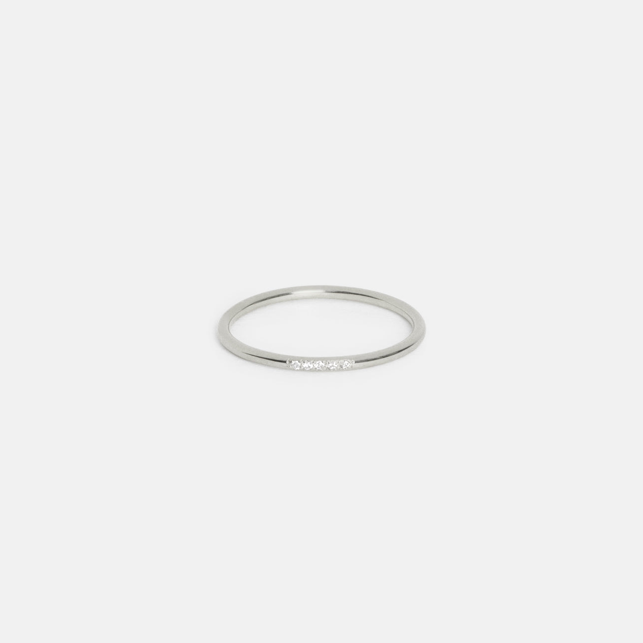 14k white gold thin wedding band with five pavé white diamonds