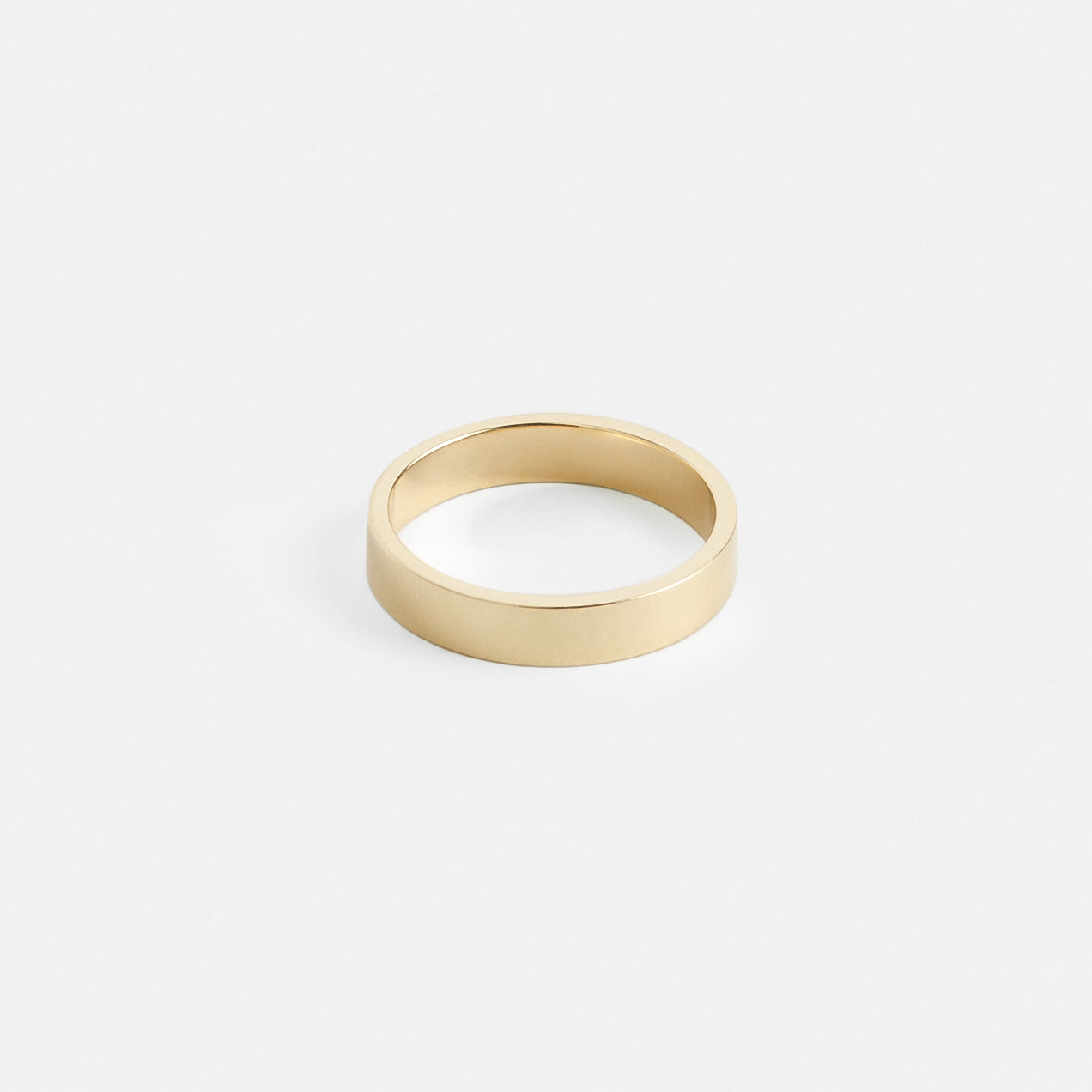 14k yellow gold 4mm flat wedding band with smooth polished finish