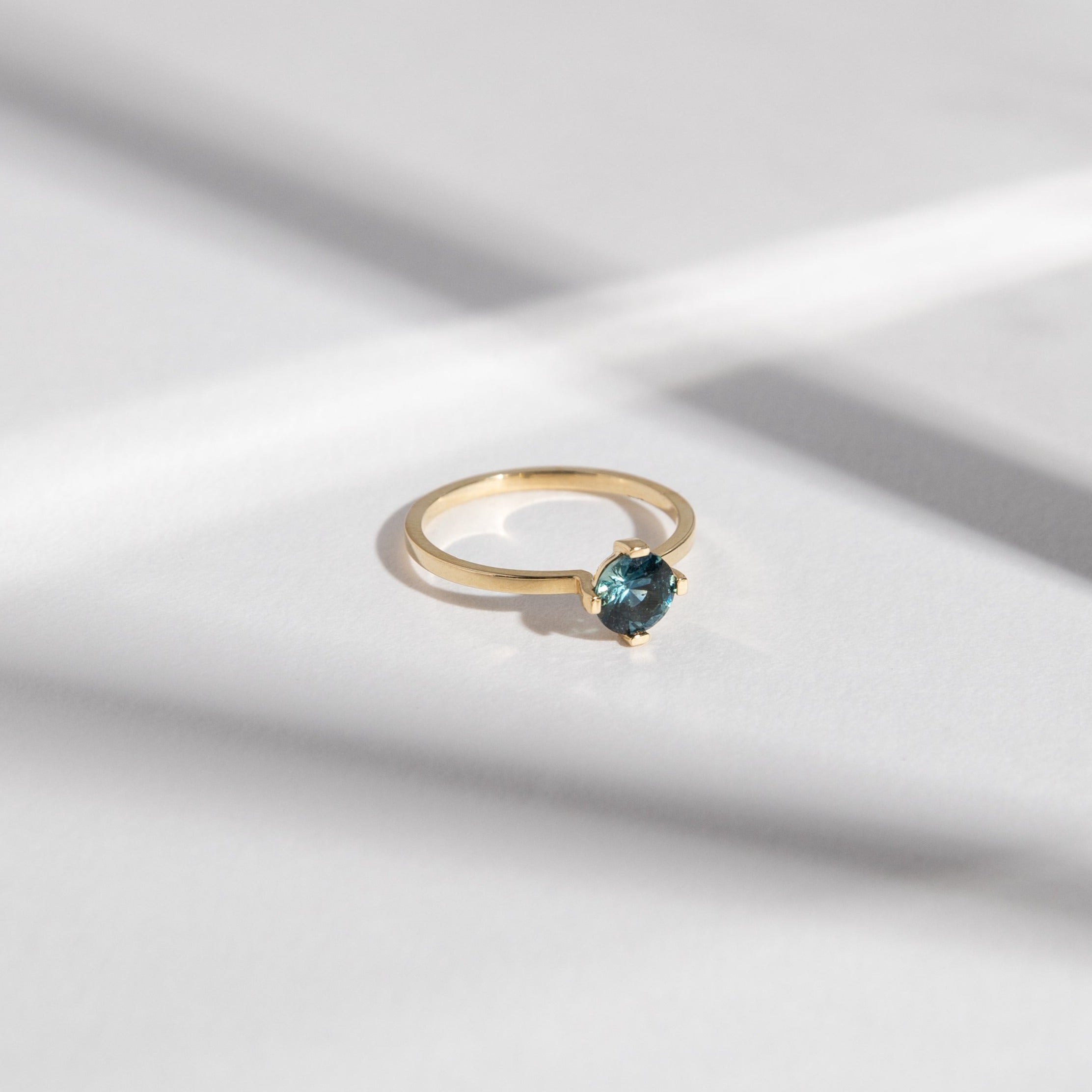 Ema Thin Ring in 14k Gold set with a 0.8ct medium round brilliant cut denim color sapphire By SHW Fine Jewelry NYC