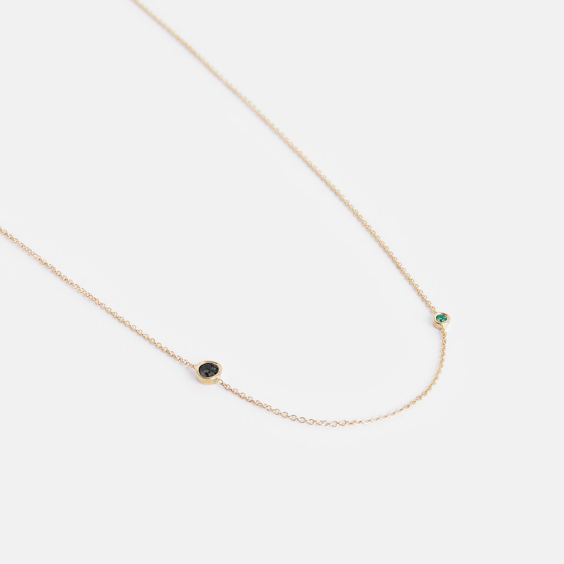 Iba Simple Necklace in 14k Gold set with Black Diamond and Emerald By SHW Fine Jewelry NYC