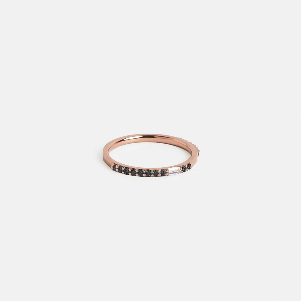 14k rose gold thin eternity band with black round and white baguette diamonds