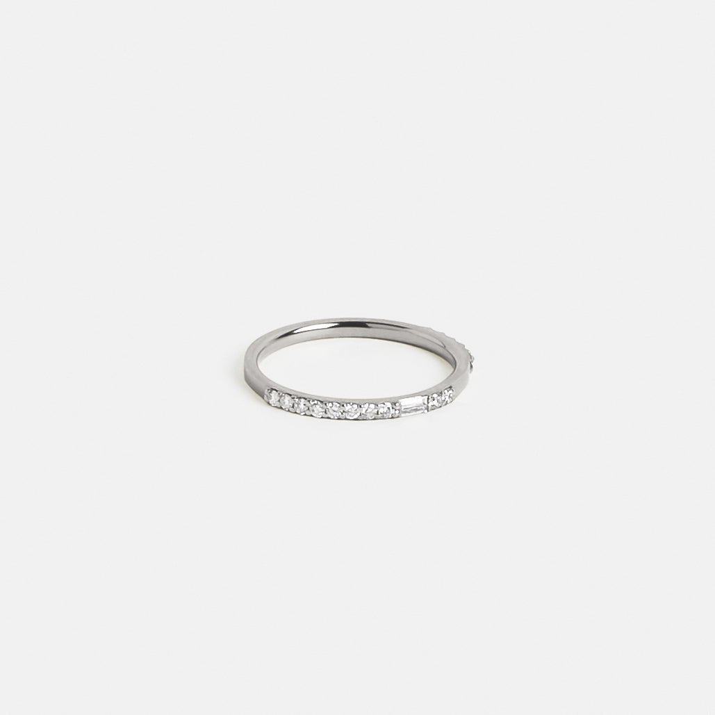 Platinum eternity wedding band with round and baguette-cut white diamonds