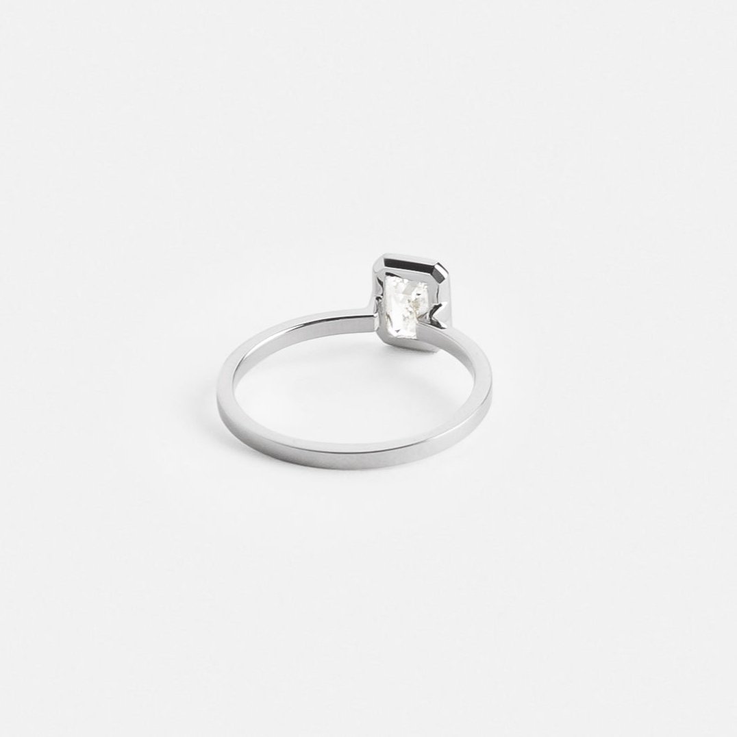 Simple Bezel Frame Engagement Ring with under one carat GIA ethical natural emerald cut diamond in platinum by SHW cool jewelry store NYC
