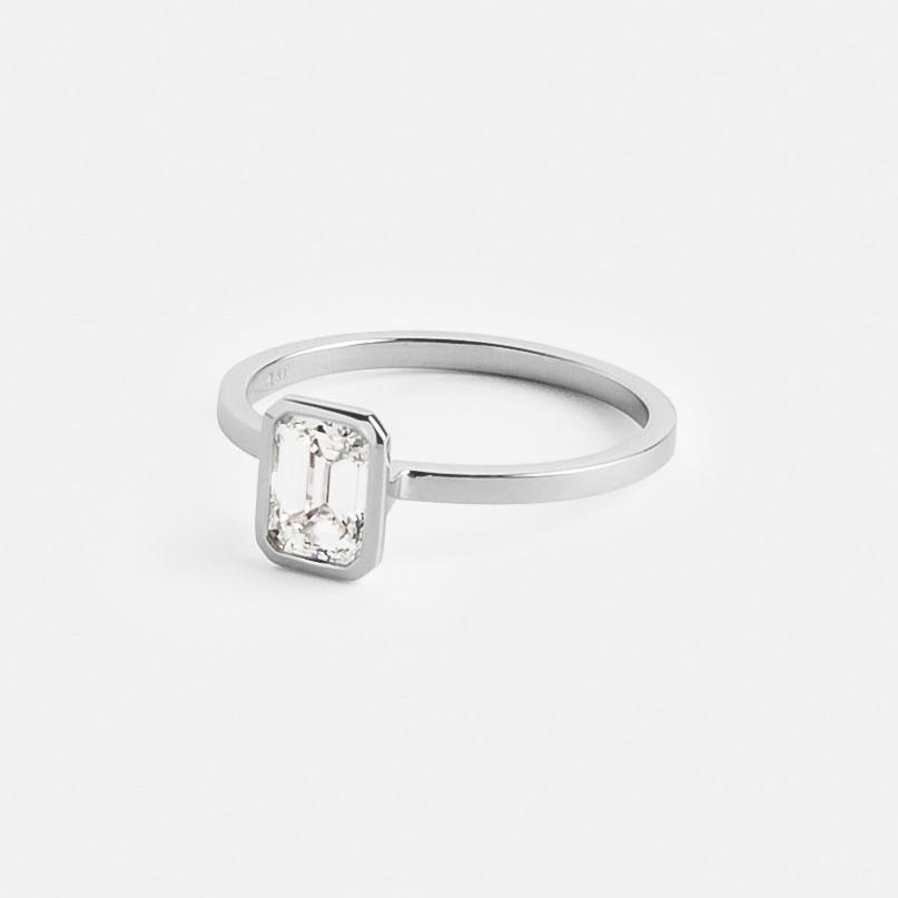 Minimalist Thin Band Engagement Ring with 0.80ct emerald-cut mined GIA certified canadian diamond in platinum by SHW fine jewelry store NYC