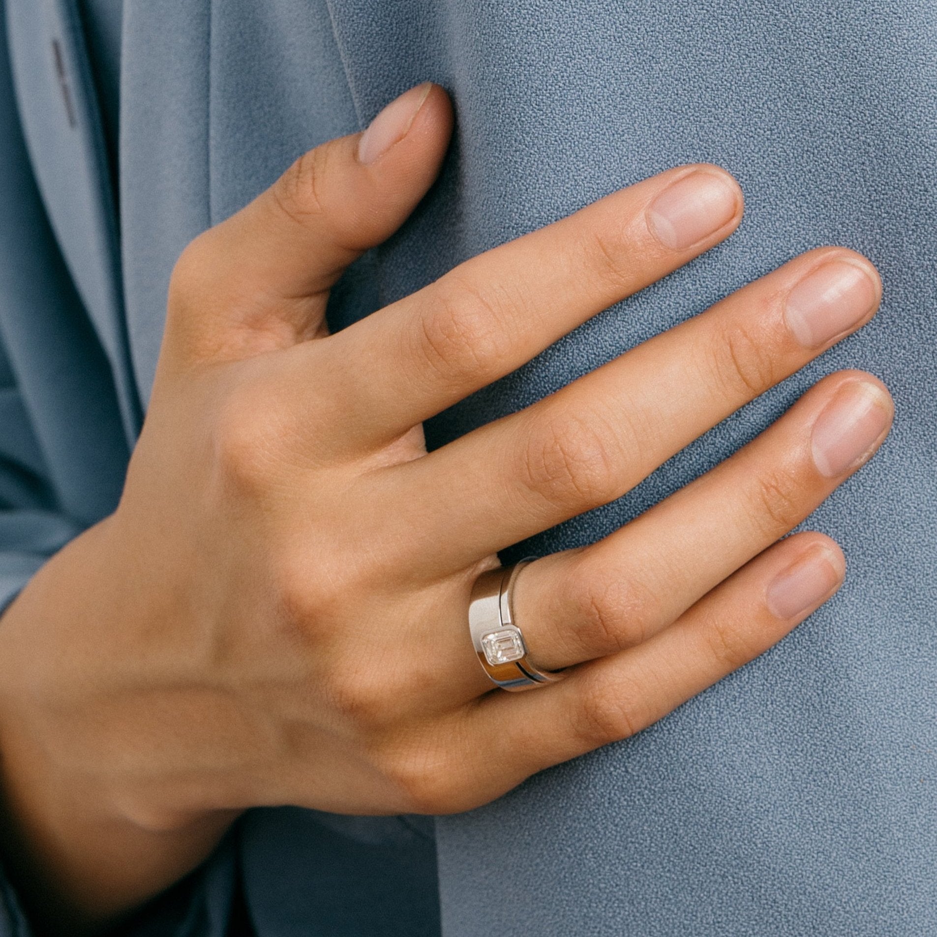 Modern Thinner Band Stackable Engagement Ring with 1 ct emerald cut white diamond in platinum by SHW famous fine jewelry stores in NYC