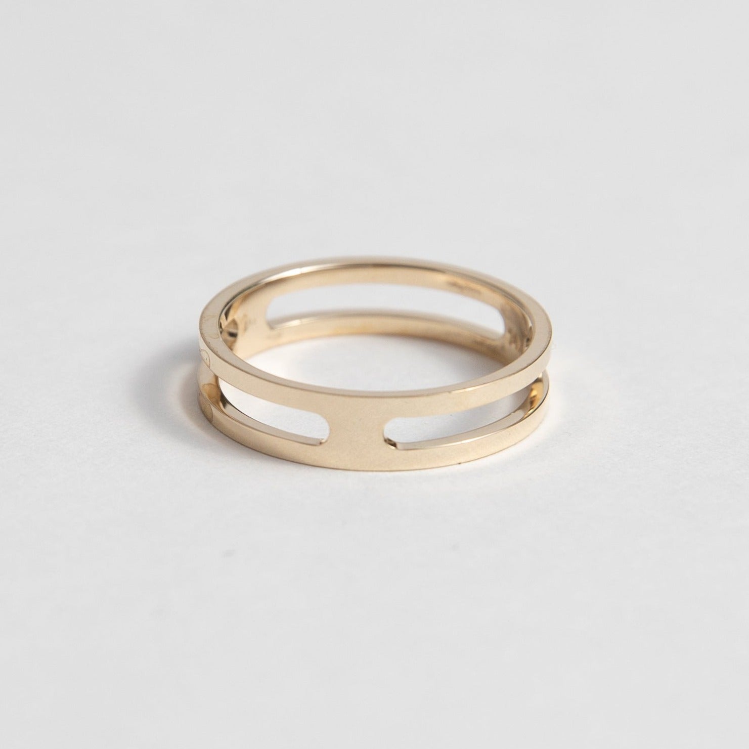 Close view of a slim polished gold ring