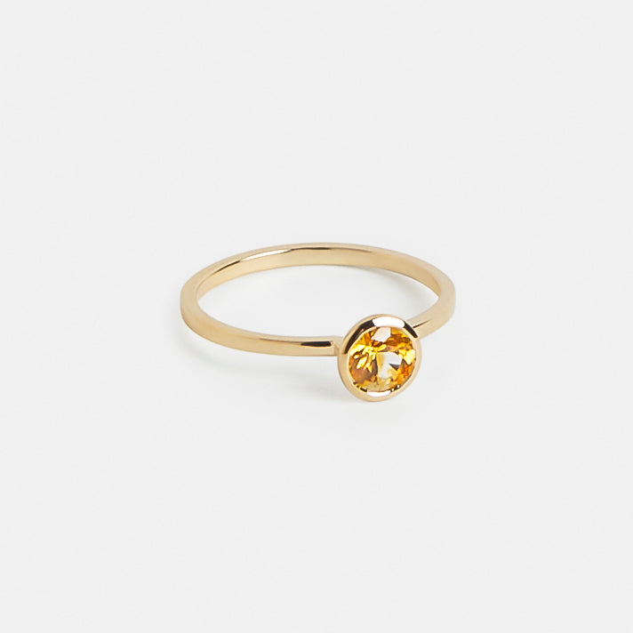 Veni Minimalist Ring in 14k Gold set with a 0.65ct round brilliant cut yellow sapphire By SHW Fine Jewelry NYC