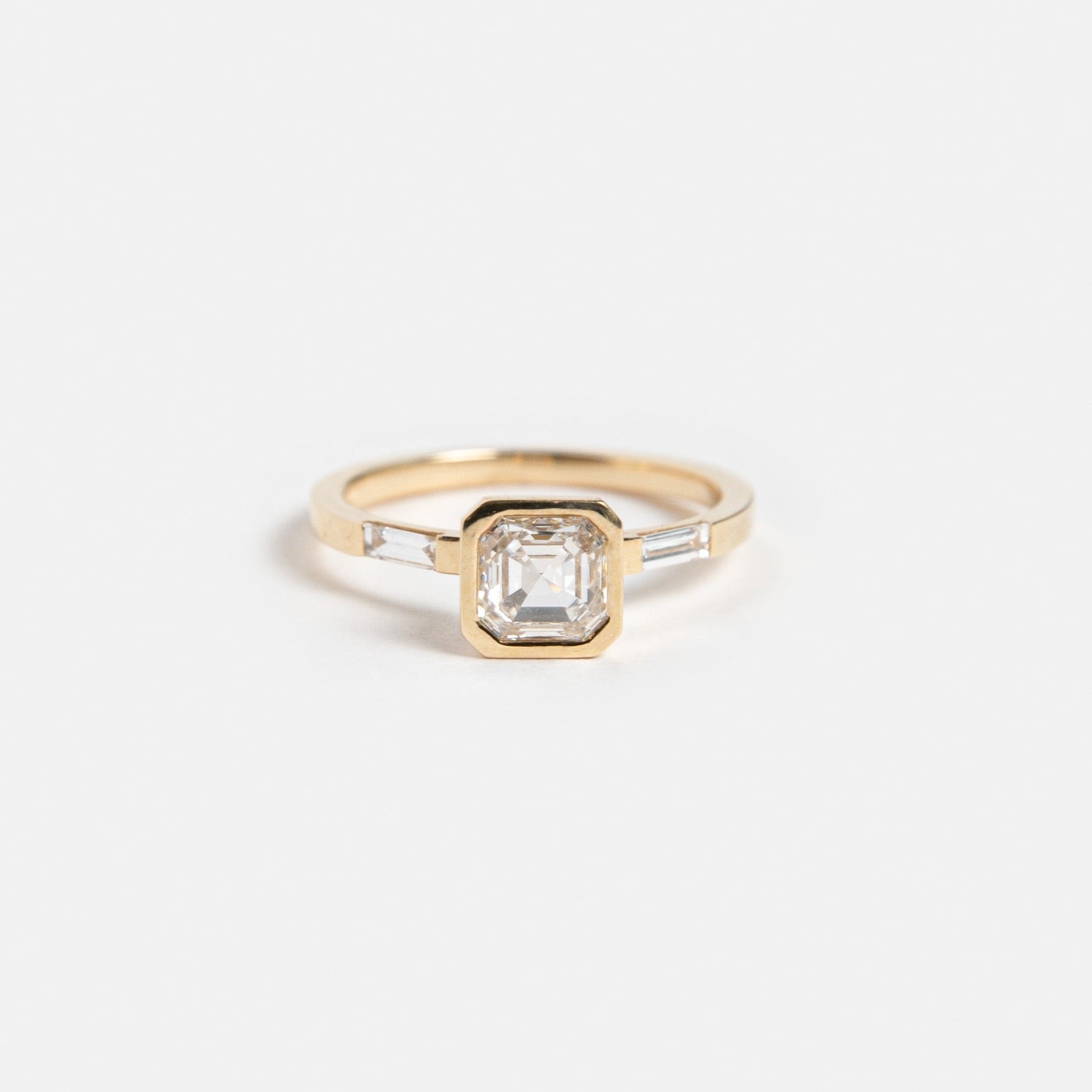 Aida Unique Ring in 14k Gold set with a square cut lab-grown diamond and two baguette cut lab-grown diamonds By SHW Fine Jewelry NYC